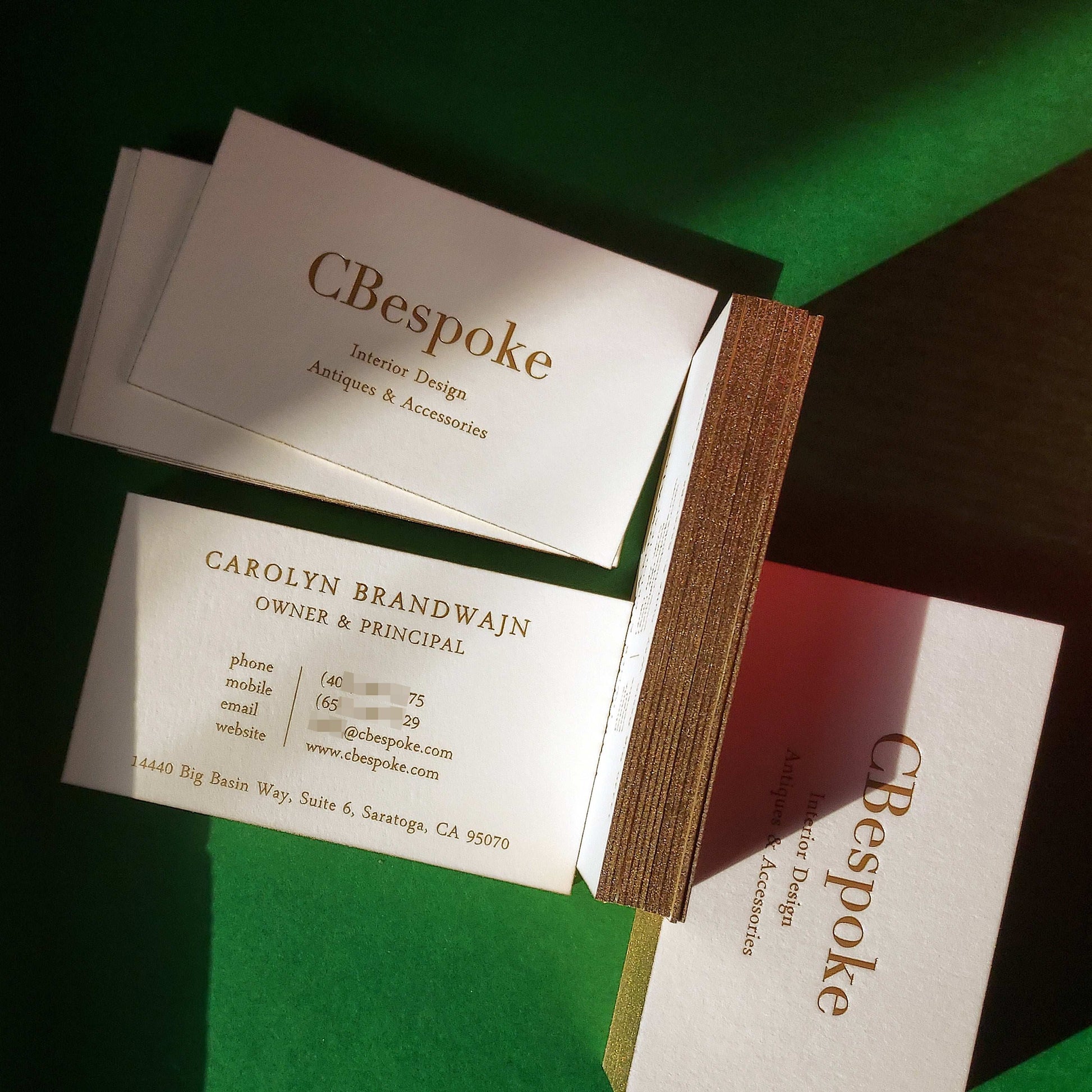 Premium cotton card with luxurious gold edges and foil.