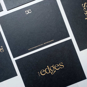Luxury black thank you card with custom deboss and foil stamping.