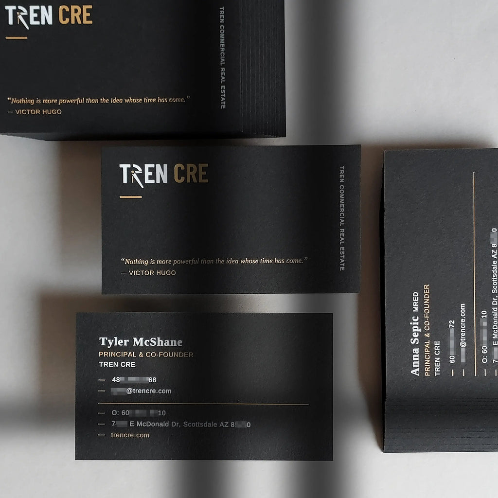 Premium black business cards by OddPlanPrint featuring double-sided gold foil and white foil stamping on heavy 38pt(700gsm) stock.