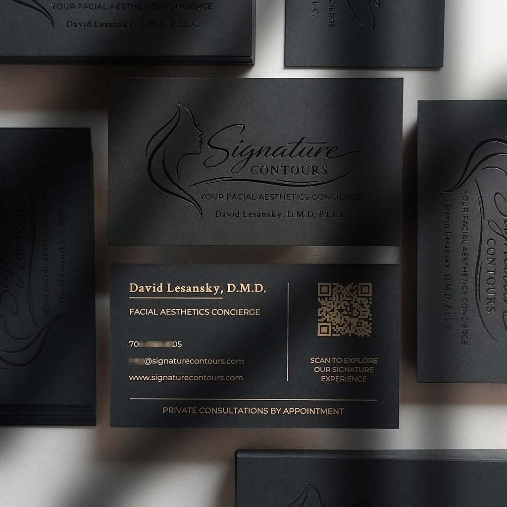 Black business cards 38pt, 700gsm with glossy black foil and matte gold foil produced by OddPlanPrint.