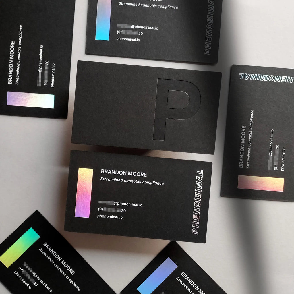 High-end black business cards with deboss, white foil and hologram foil on 38pt(700gsm) stock. made by OddPlanPrint.