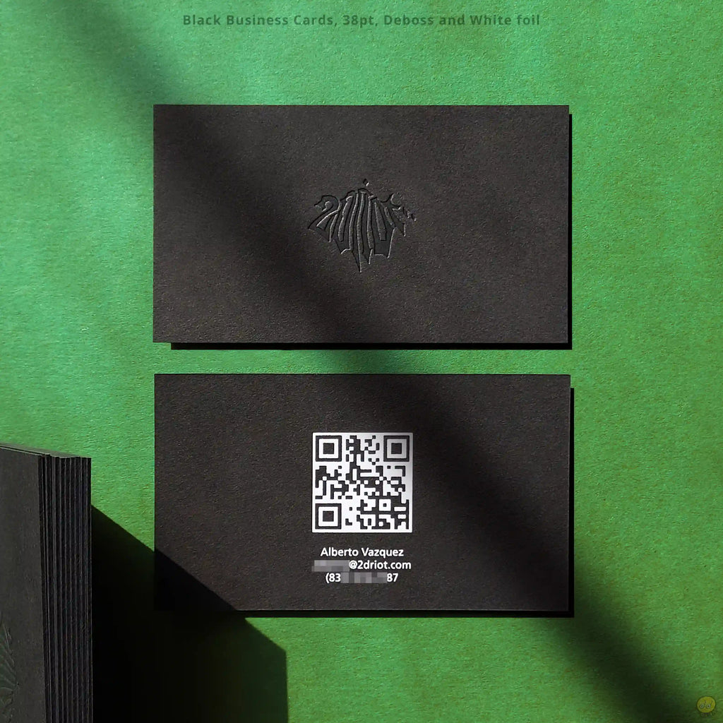 OddPlanPrint's black card pairs a recessed logo with white foil for a premium, memorable finish.
