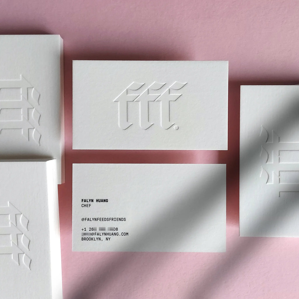 Premium 45pt blind letterpress business cards by OddPlanPrint featuring tactile un-inked debossing and black crisp printing on 750gsm cotton.