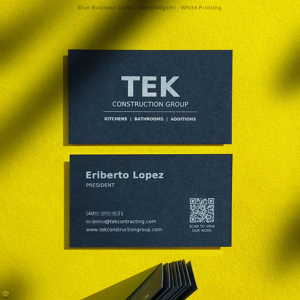 Blue business cards with white printing by OddPlanPrint.