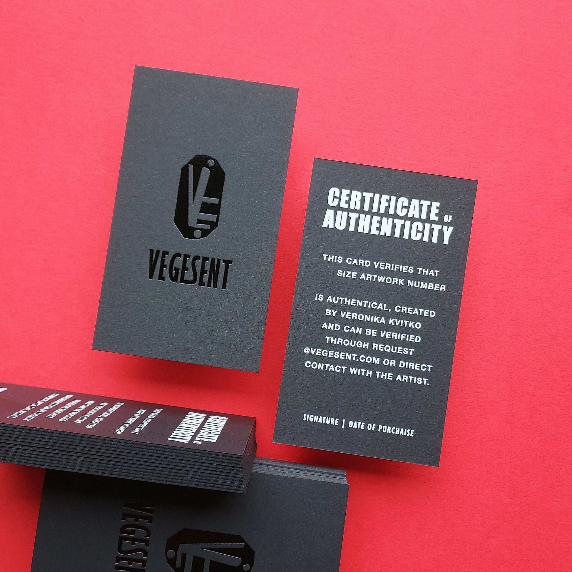 Rush-produced luxury black card with foil and blind deboss