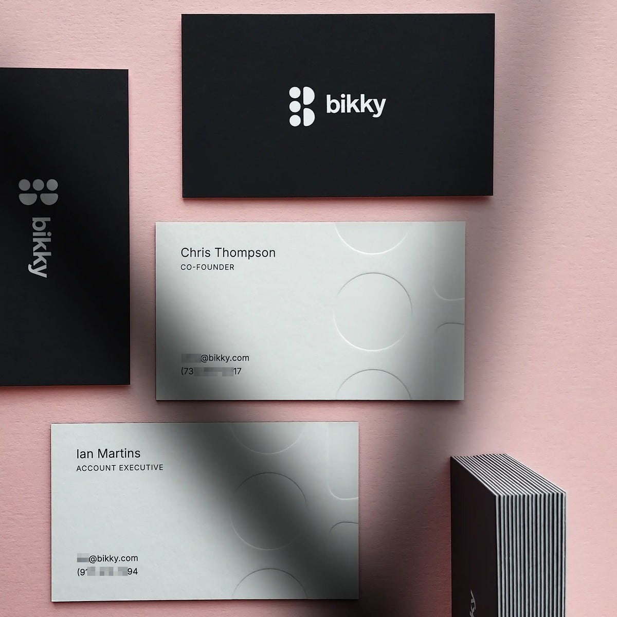 OddPlanPrint 38pt duplex business cards displaying precise blind deboss texture and sharp black printing on white paper.