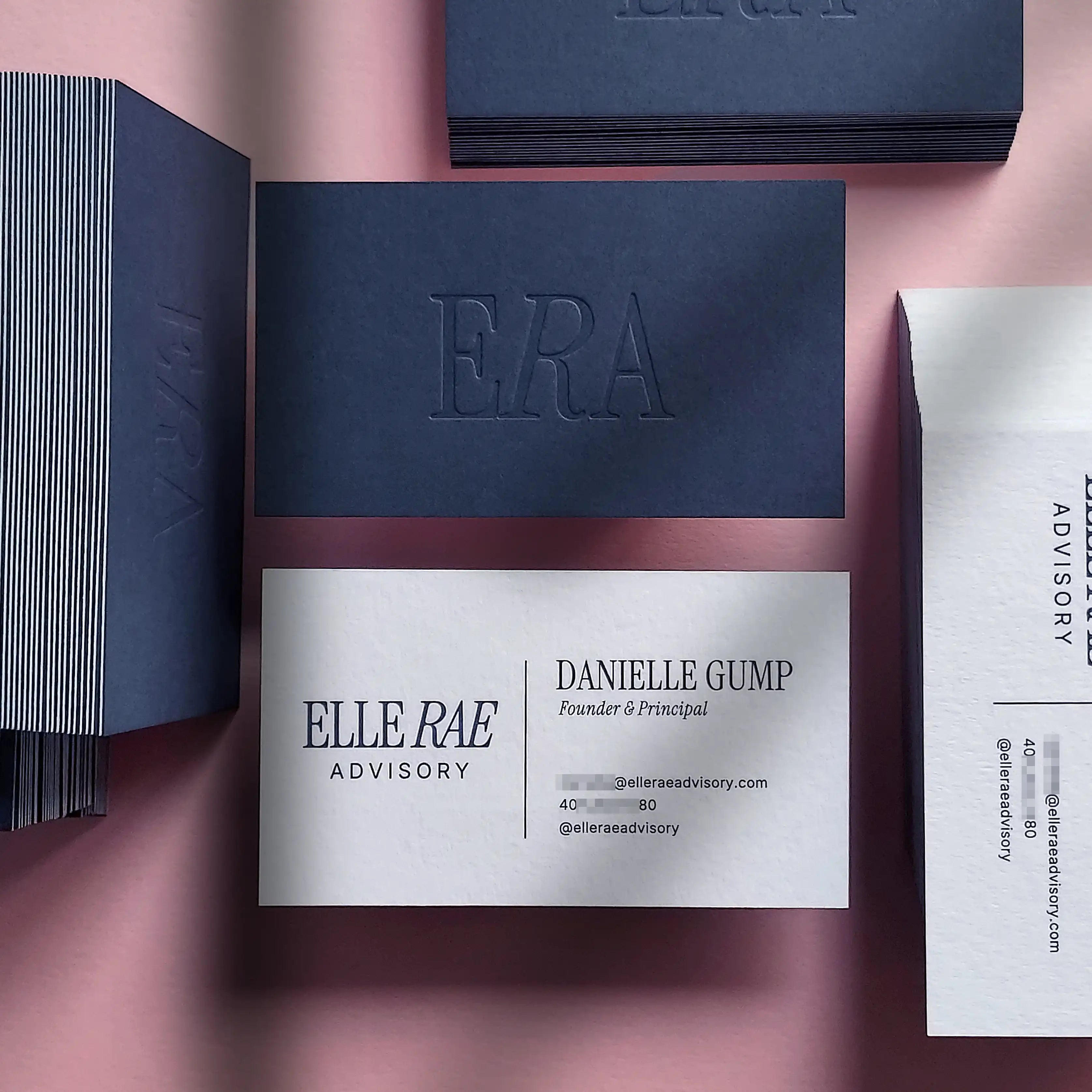 Colorplan blue and white duplex business cards 540gsm with deboss and blue, black Pantone printing by OddPlanPrint.