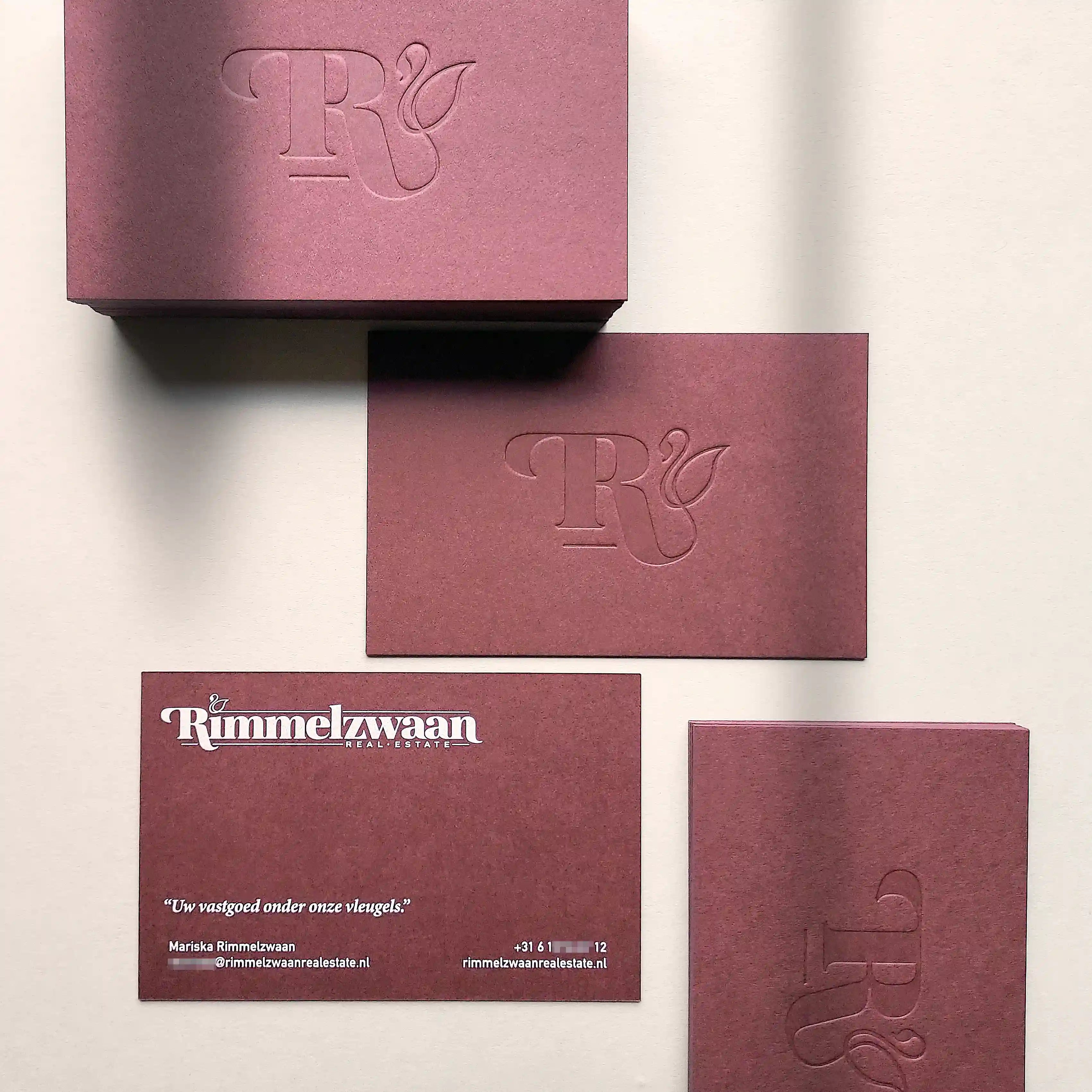 Luxury 38pt Claret business cards featuring blind deboss and crisp white printing by OddPlanPrint.