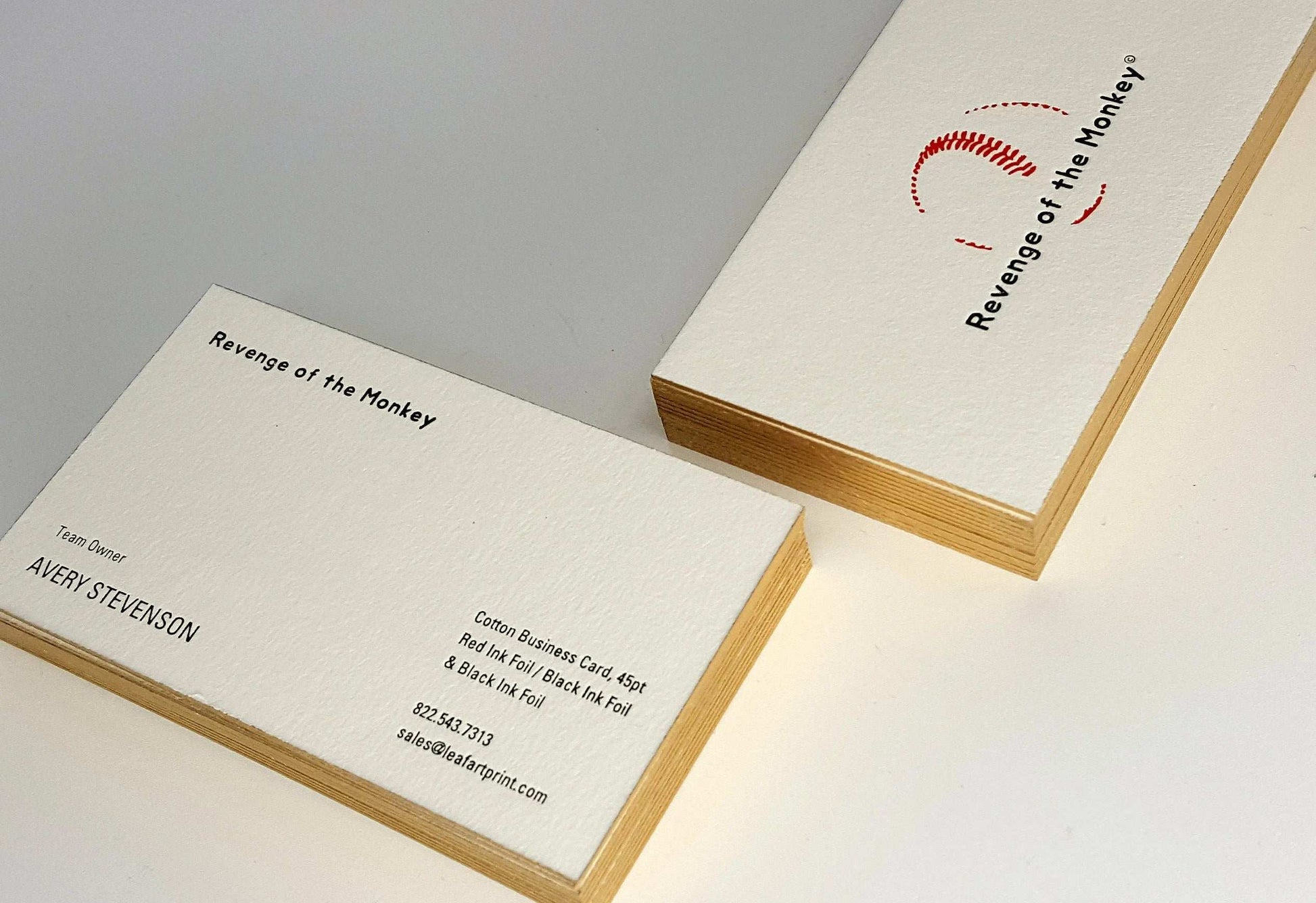 Premium cotton business card with edge-painting in rich gold.