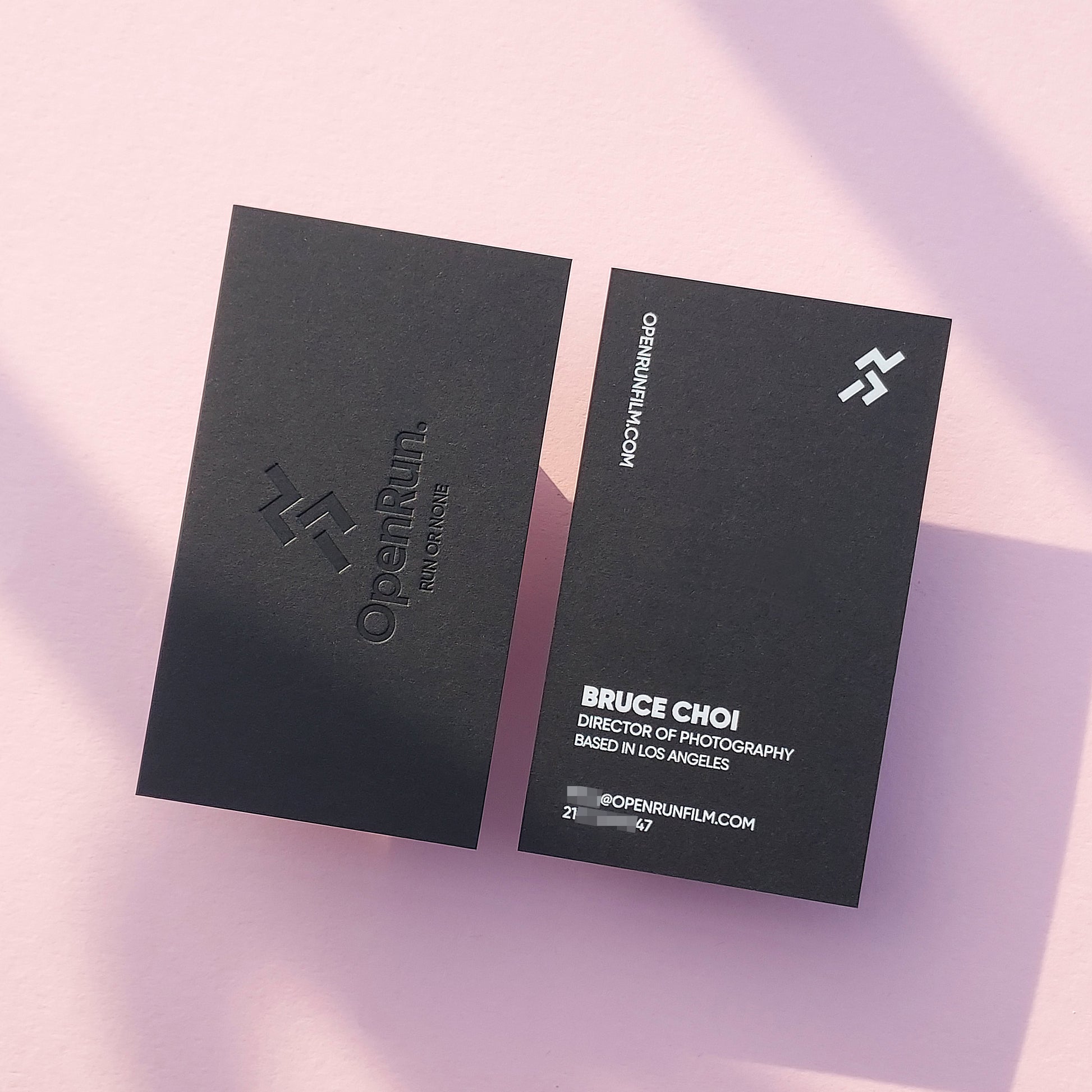 Luxurious thick black card with fine blind deboss