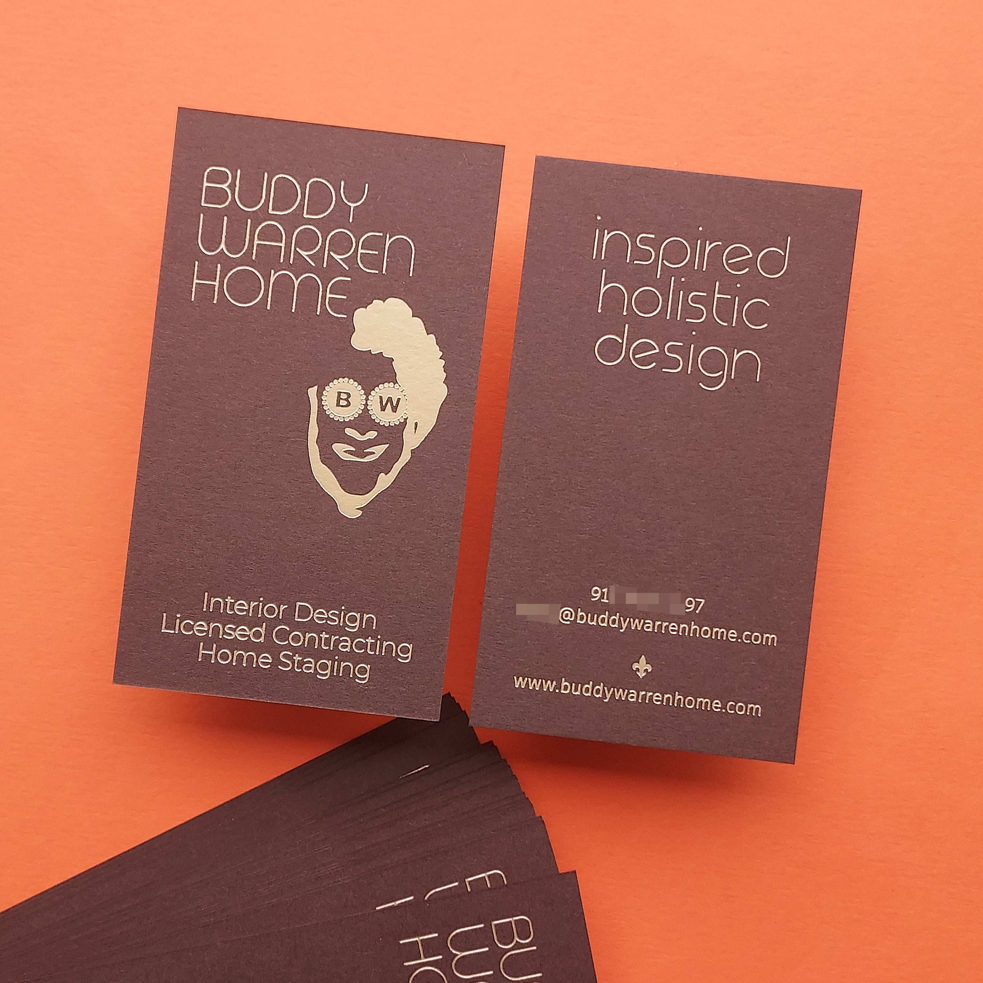 Elegant brown letterpress business card with foil accents for artists.