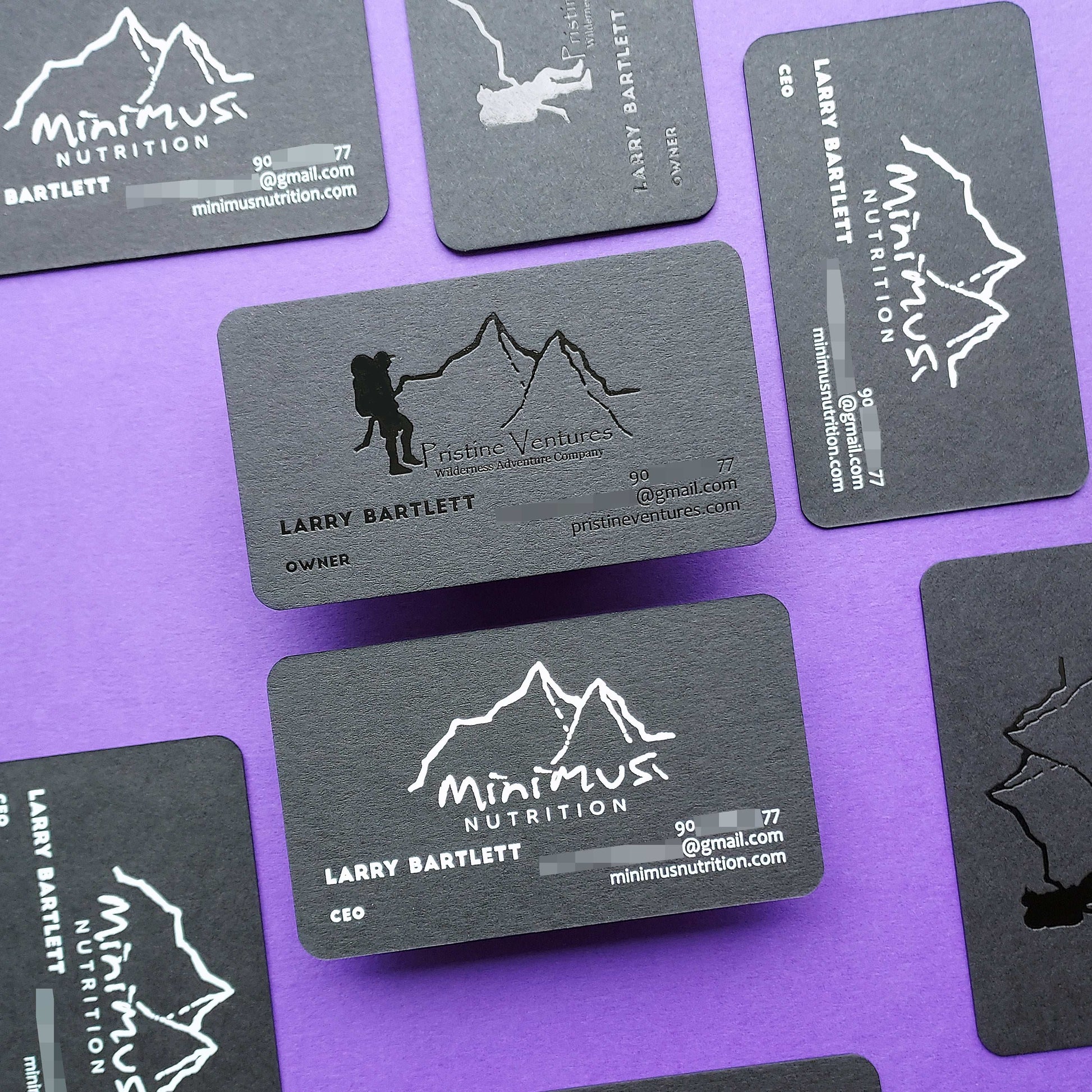 High-end black business card with embossed details