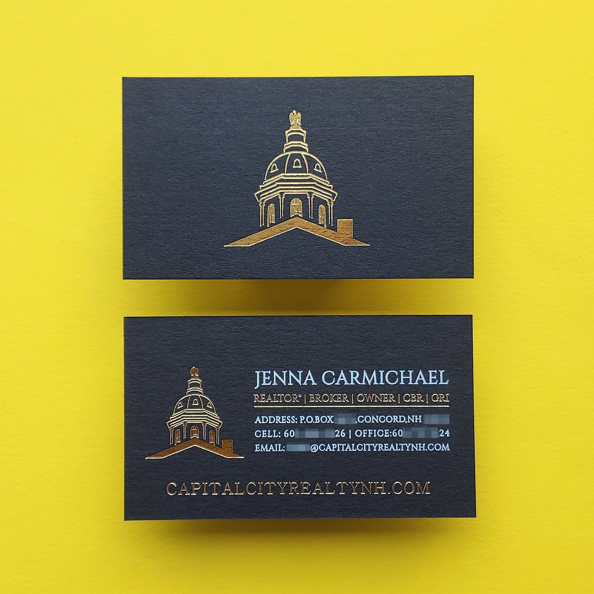 Luxuriously crafted black card with deep foil impression