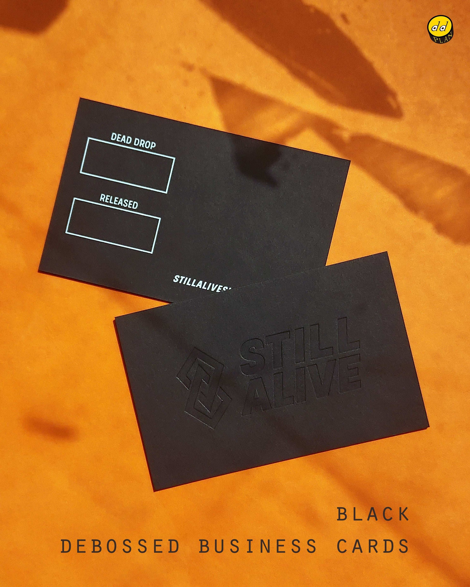 High-quality black business card with letterpress deboss