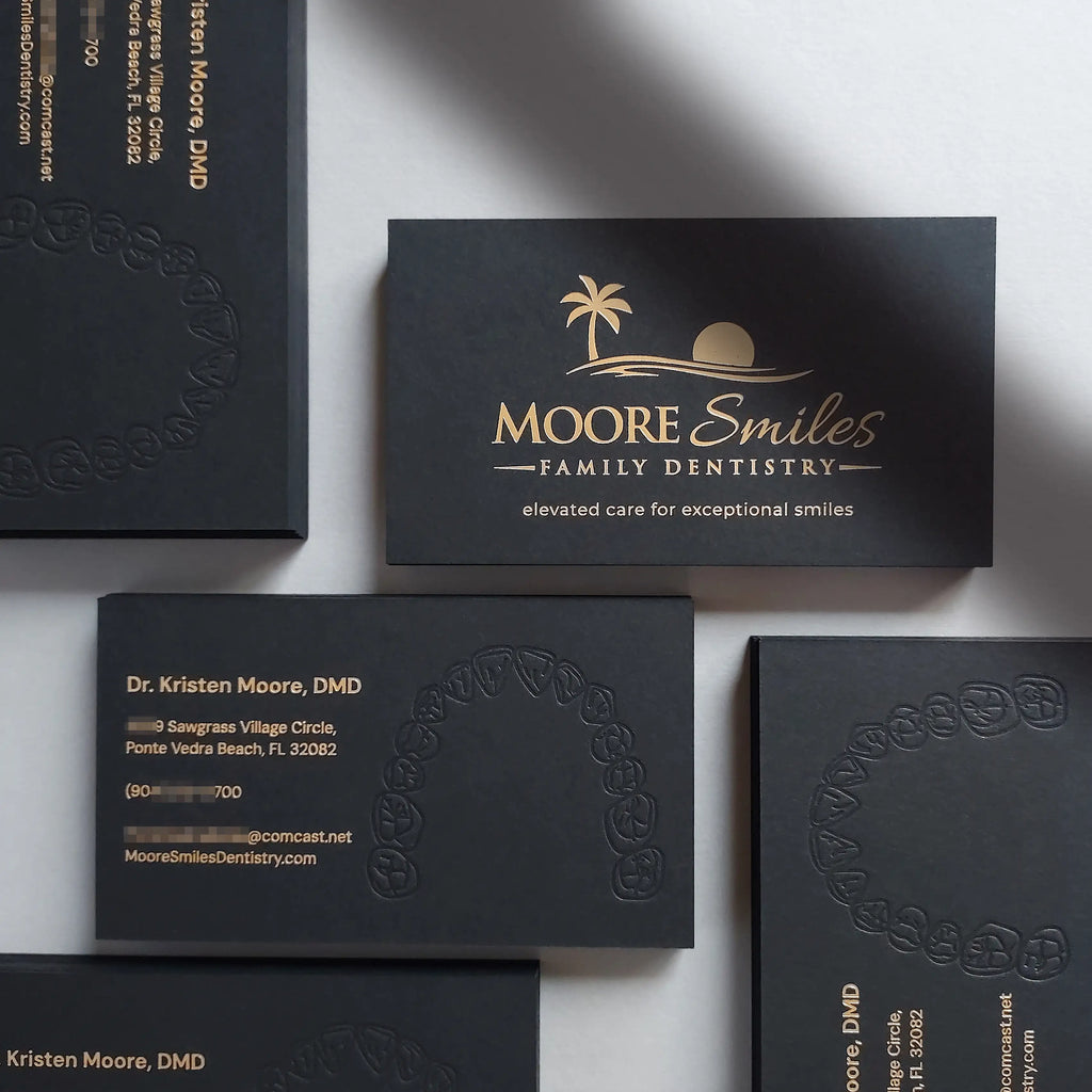 Premium black debossed business cards 38pt(700gsm) with blind deboss and gold foil made by OddPlanPrint.