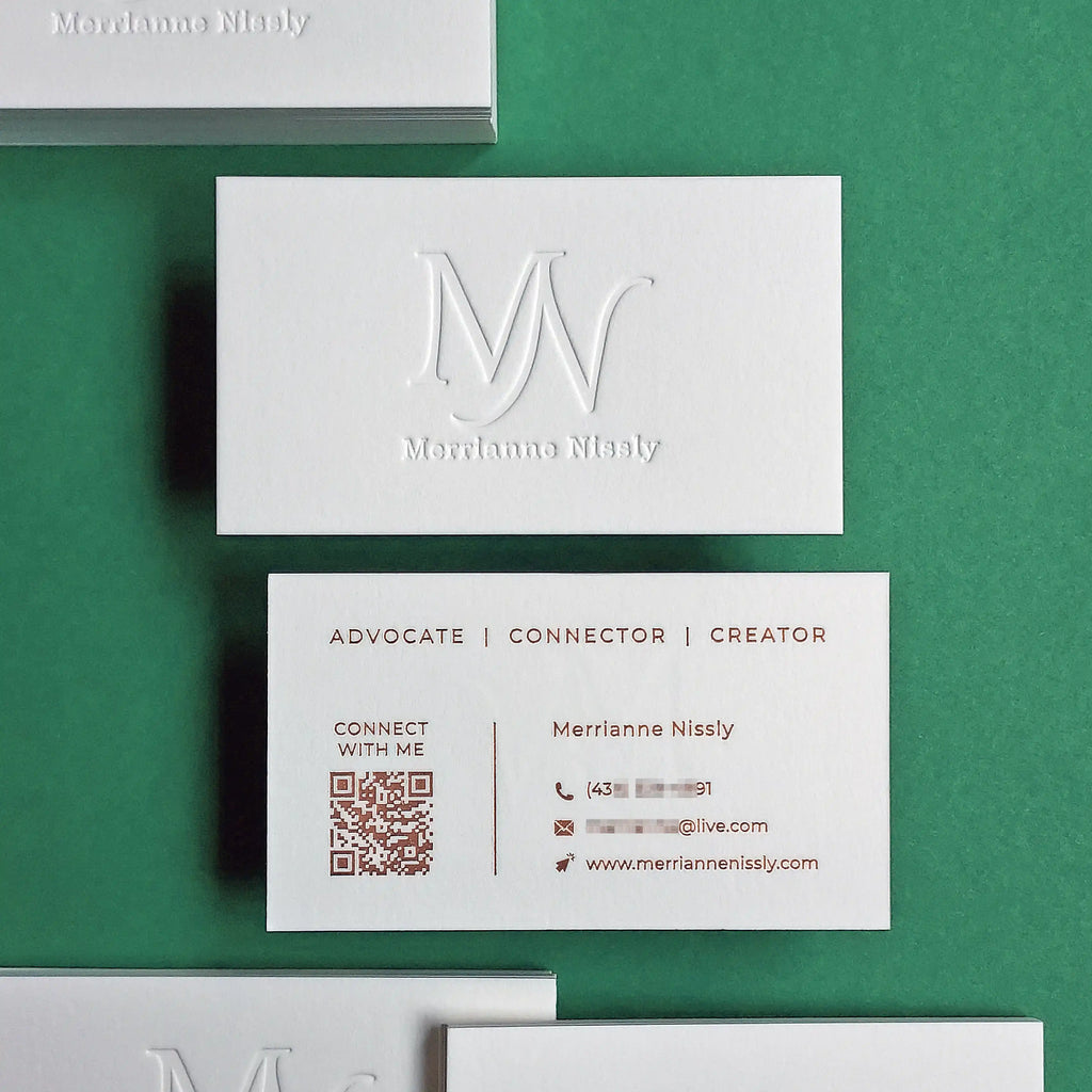 Debossed cotton business cards 45pt 750gsm with deboss and copper foil by OddPlanPrint.