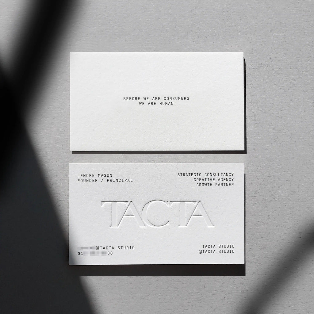 Cotton debossed business cards 45pt with blind deboss and black printing finished by OddPlanPrint.