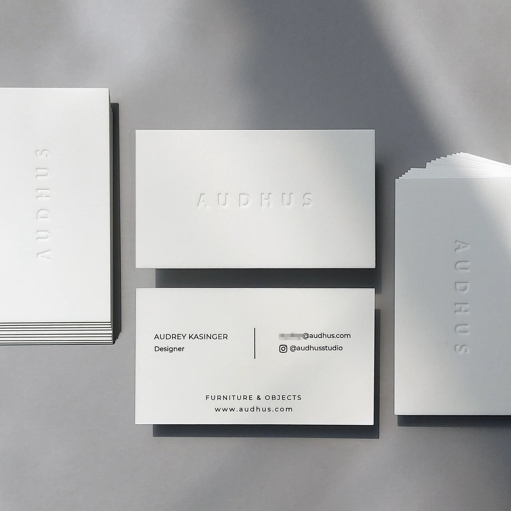 Debossed business cards, cotton 750gsm thick stock, glossy black foil printing by OddPlanPrint.