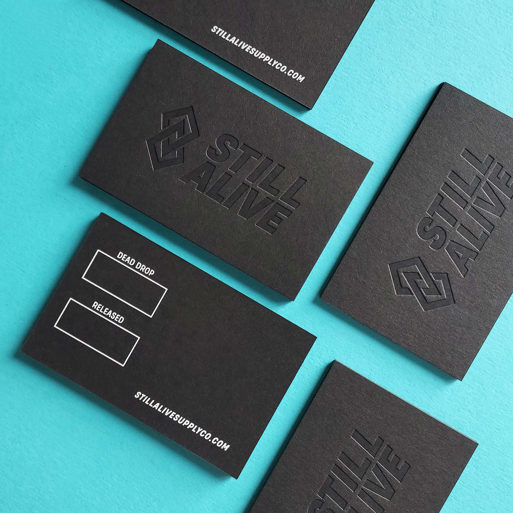 Modern premium black business card with foil and letterpress finish