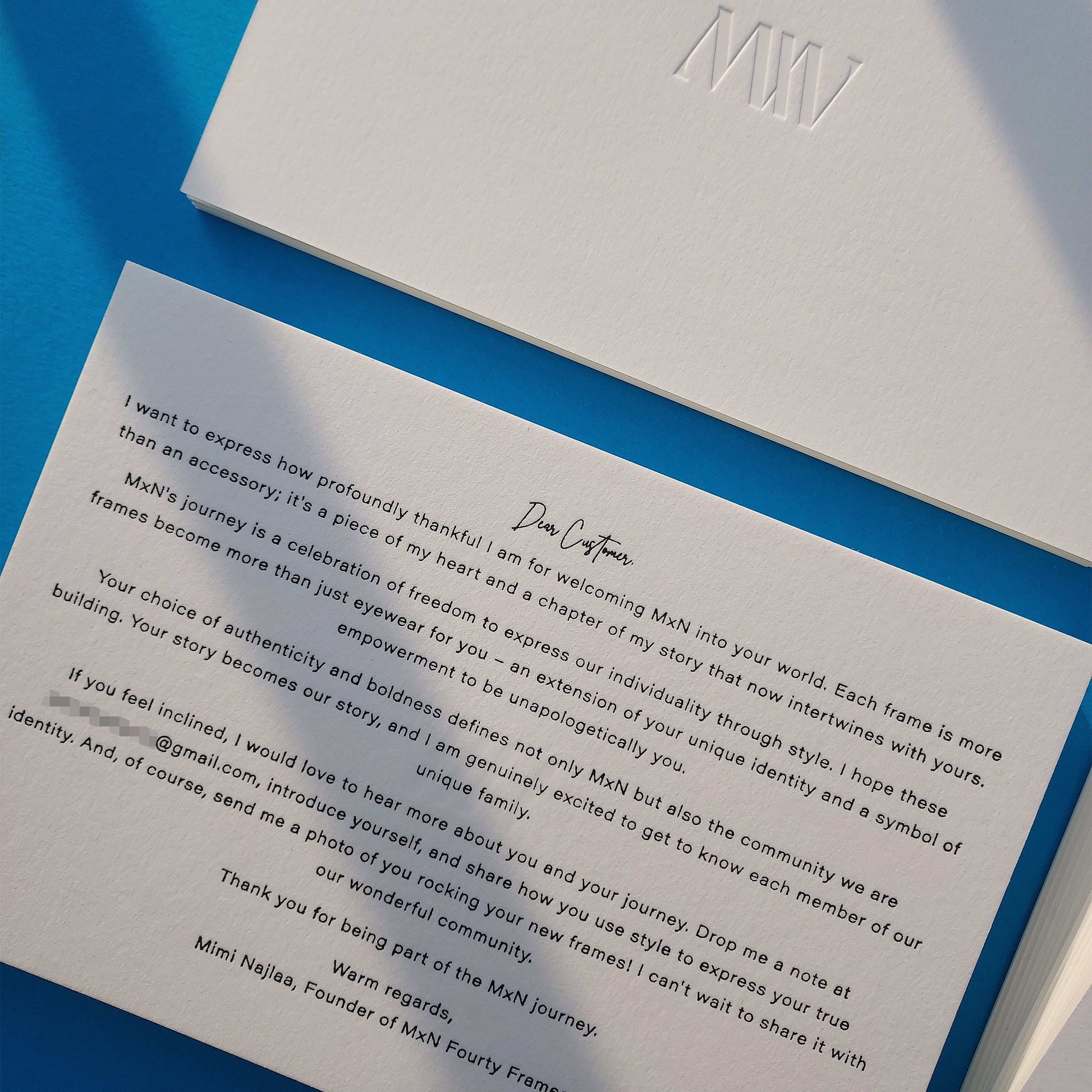 Cotton card with debossed logo, perfect for business thank you notes