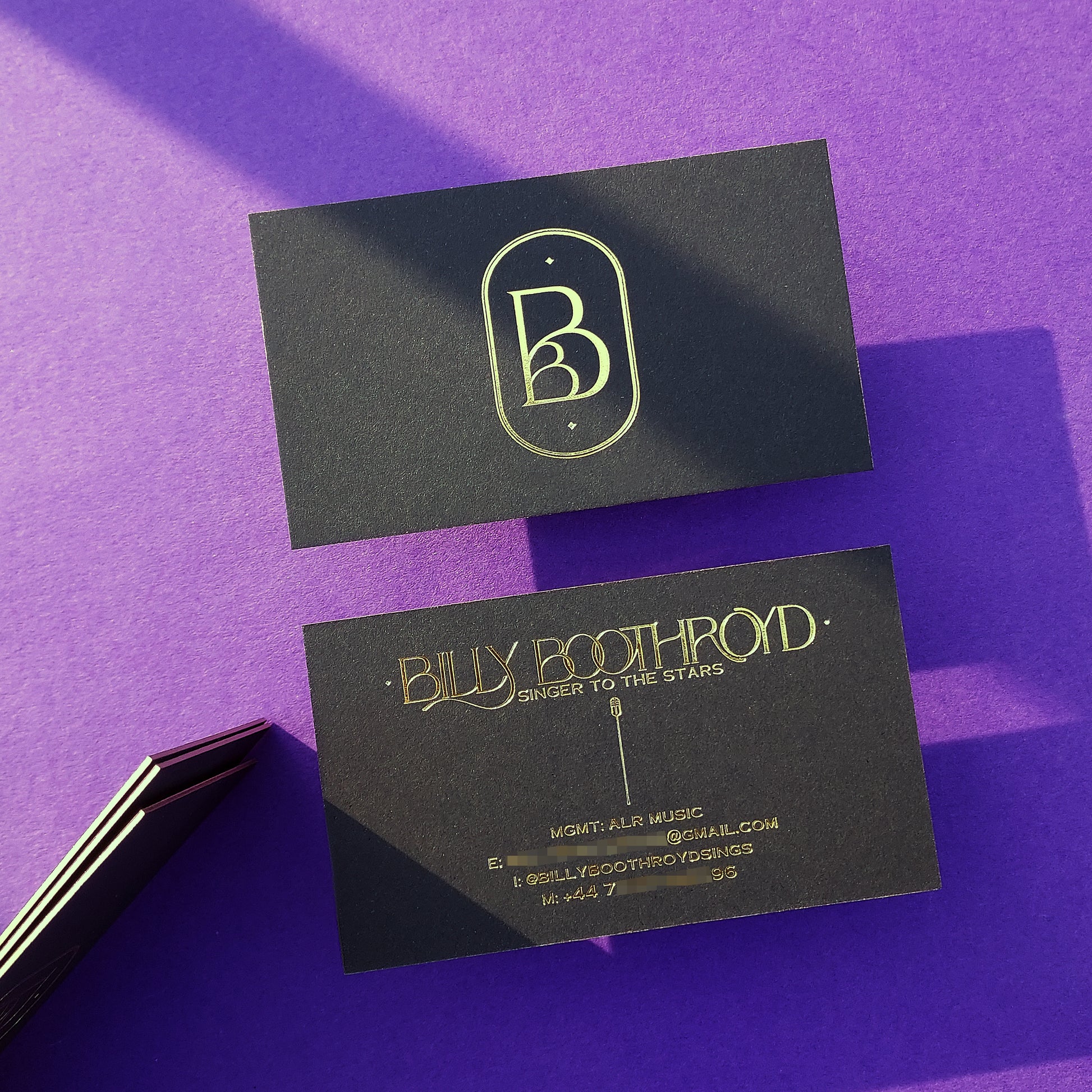 Gold foil black card with rush production