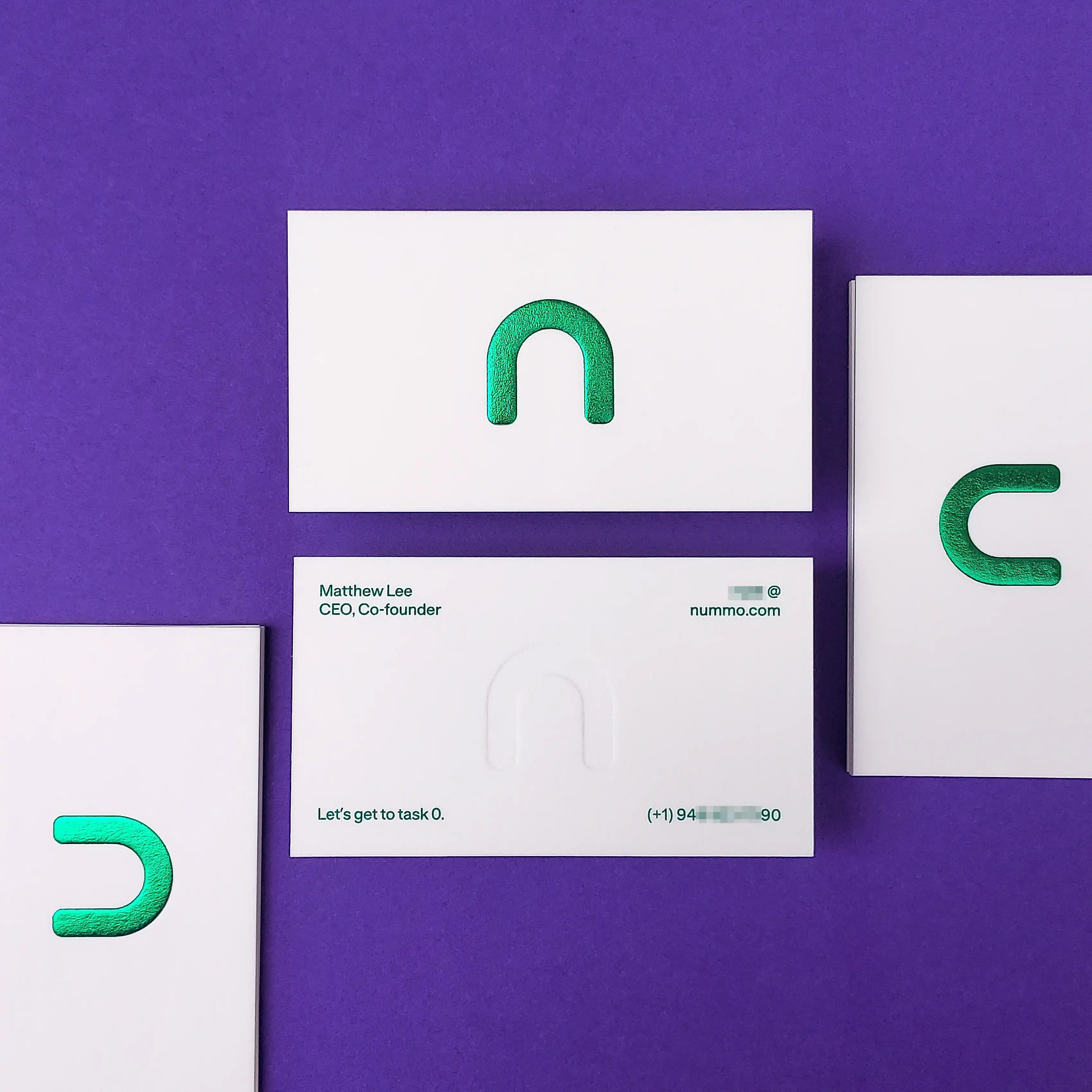 Luxury 45pt cotton embossed business cards with green foil on front and green pantone on back OddPlanPrint