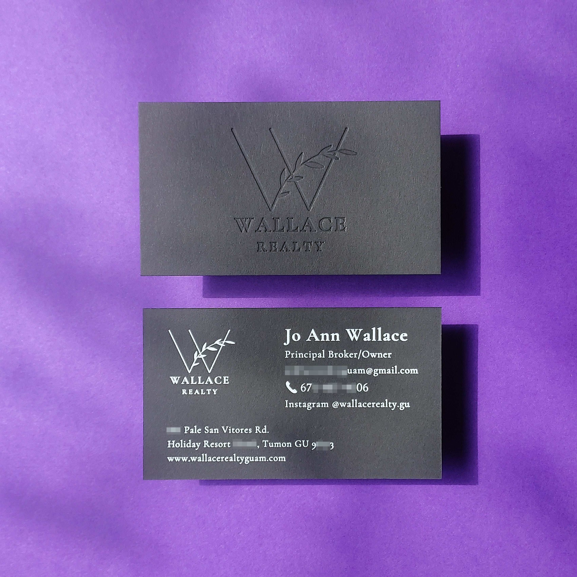 Custom black card with deep blind deboss and bold foil highlight