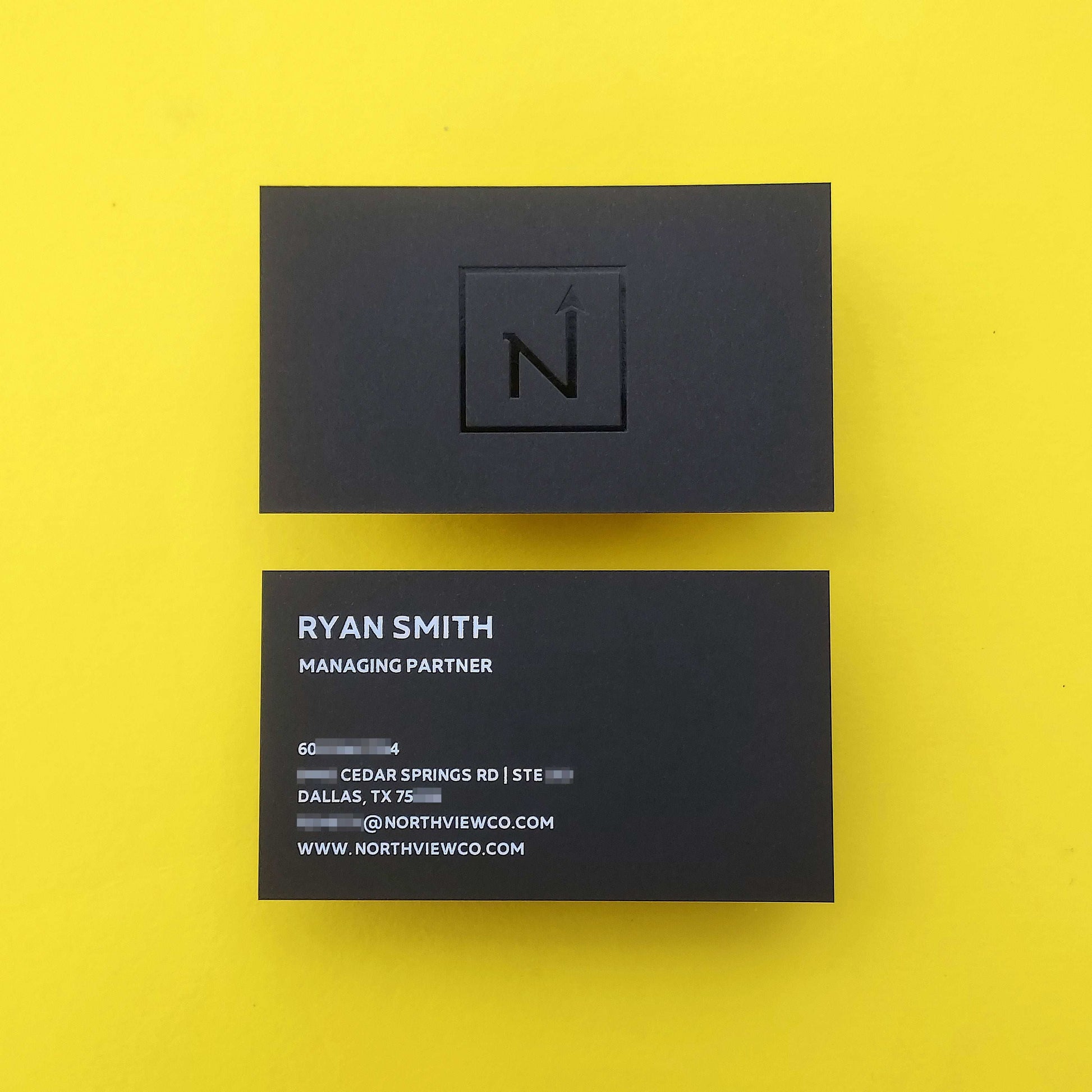 Stylish black foil card with bespoke deboss finish