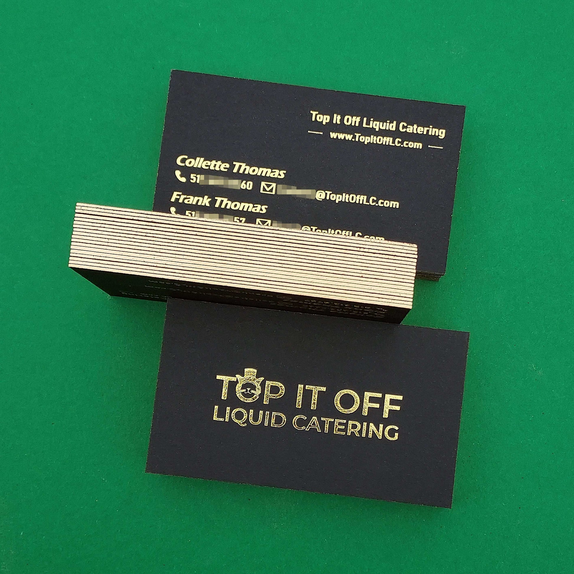 Elegant black card with foil print and gold-painted border.
