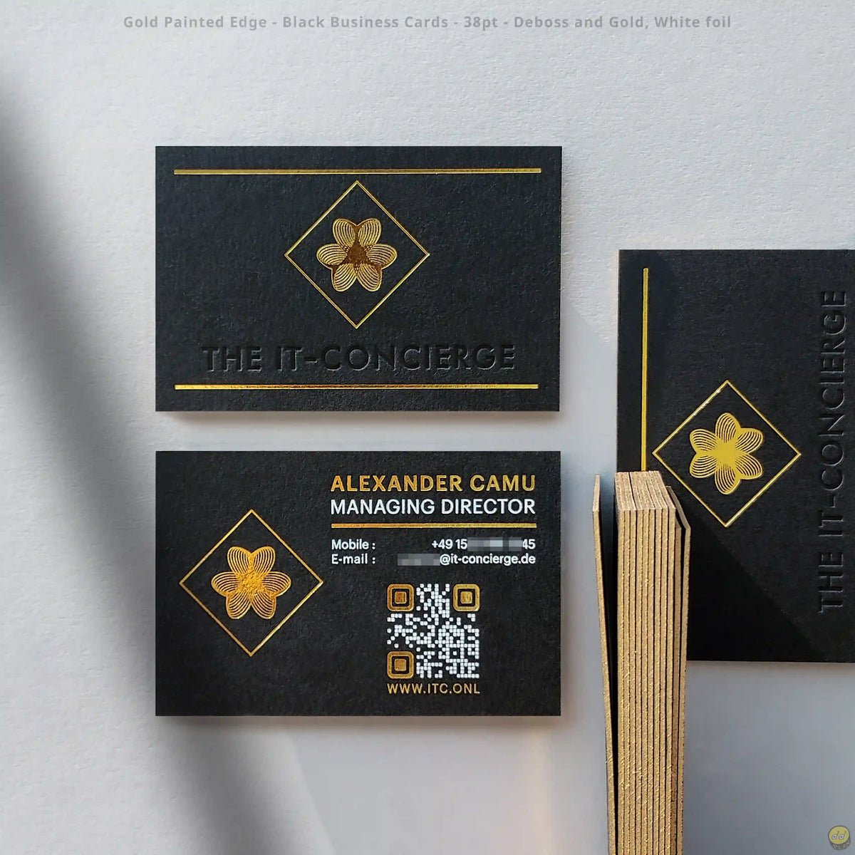 Black business cards with gold painted edges, deboss and dual foil by OddPlanPrint.