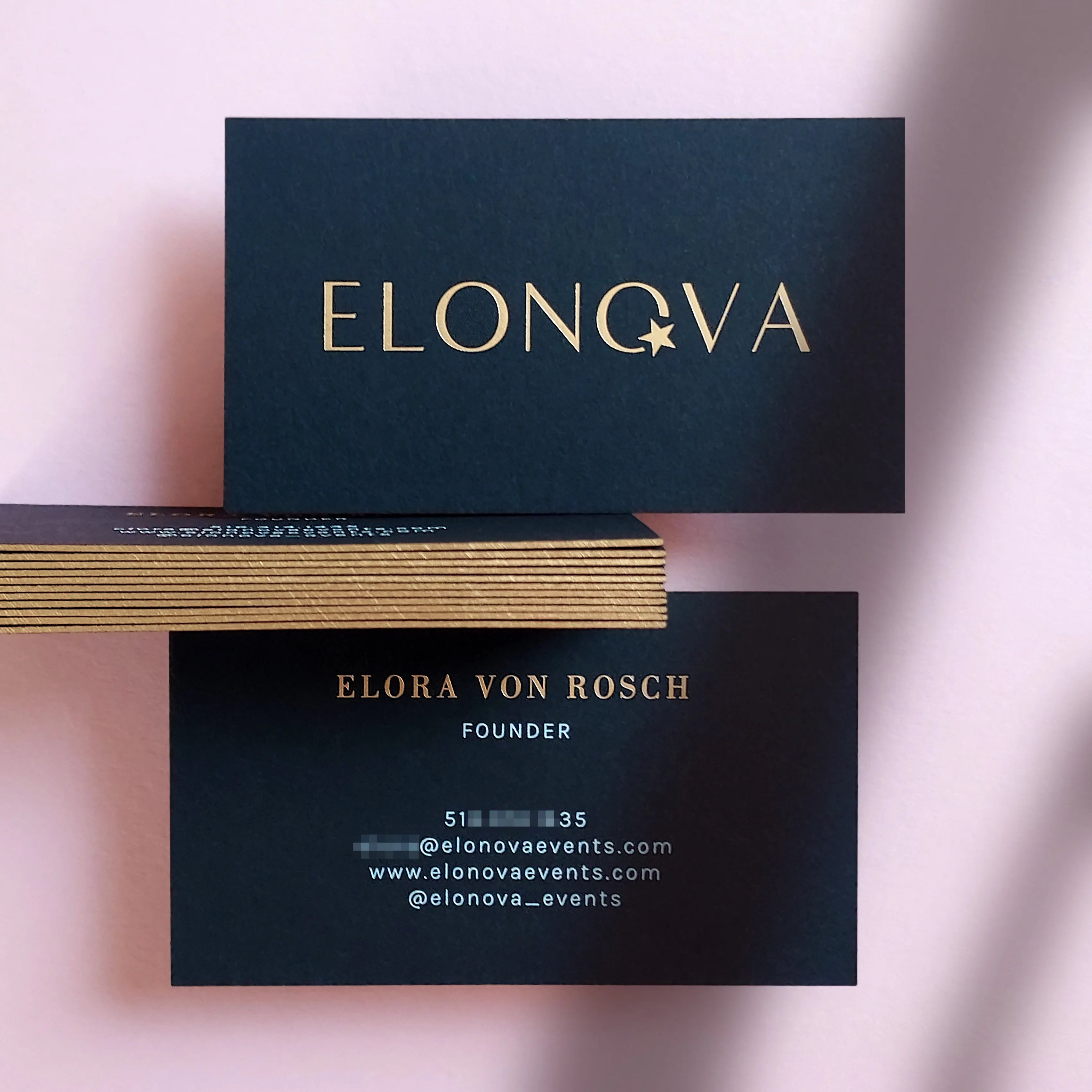 High-end black business cards 38pt thick with gold painted edge, gold foil and white foil. produced by OddPlanPrint.