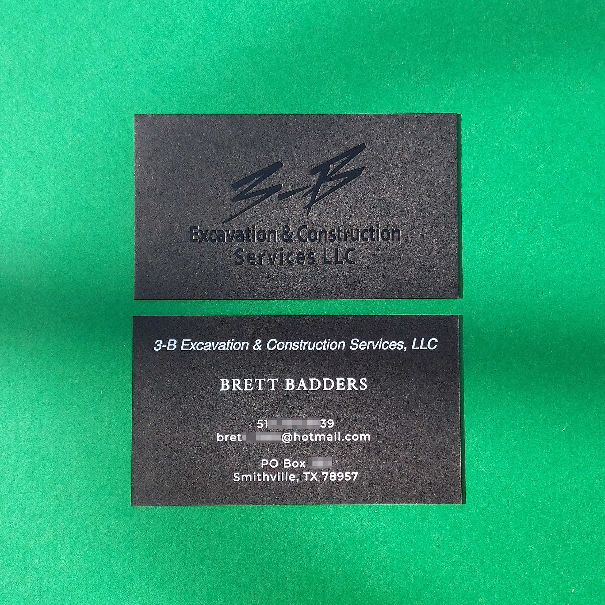 Embossed and debossed custom black business card