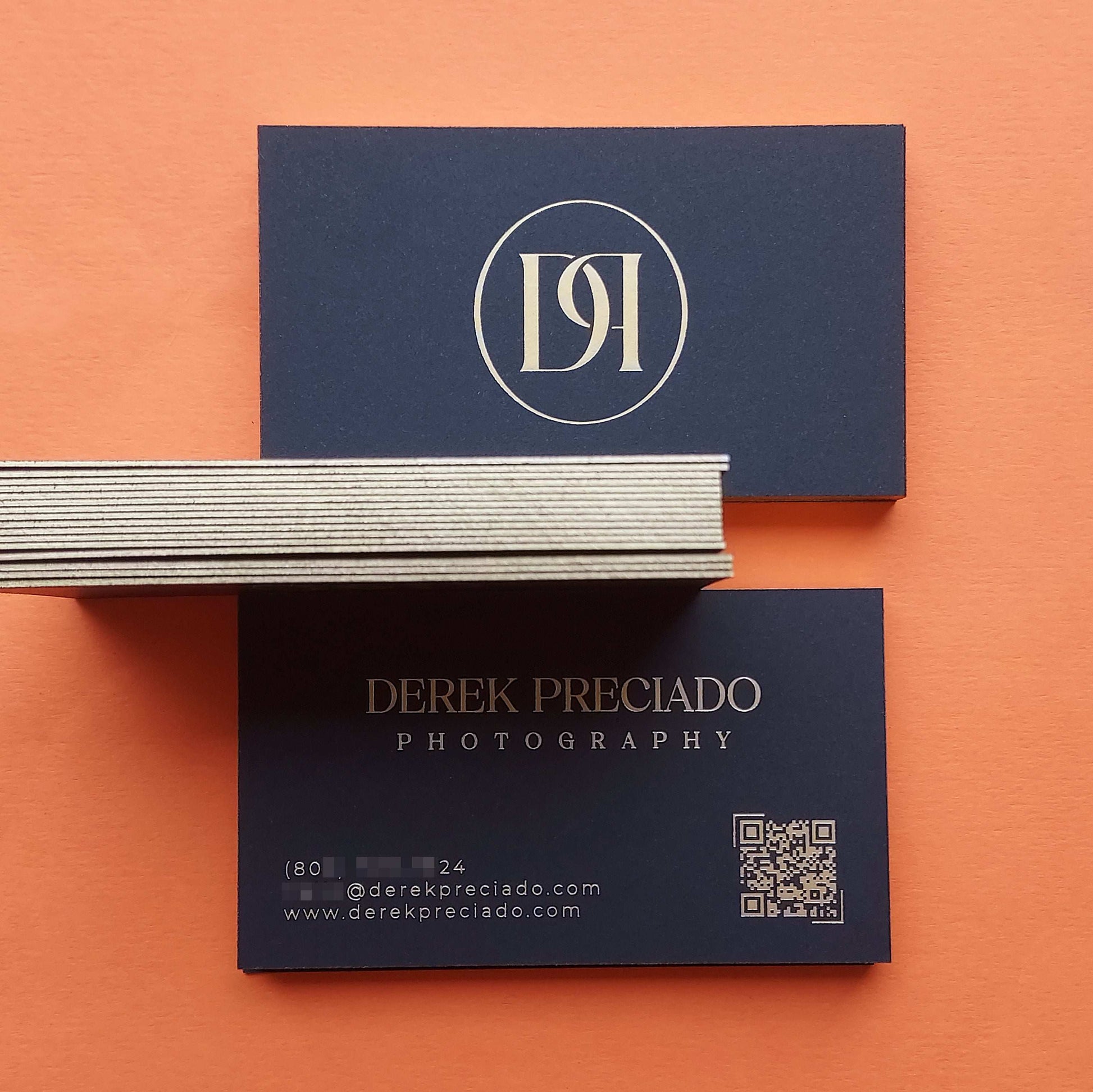 Elegant gold edge-painted card in black with handmade foil detailing.