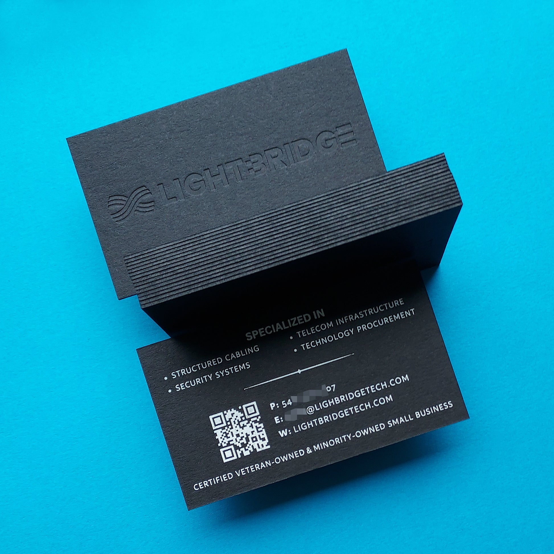 Tailor-made black card with luxury deboss and foil