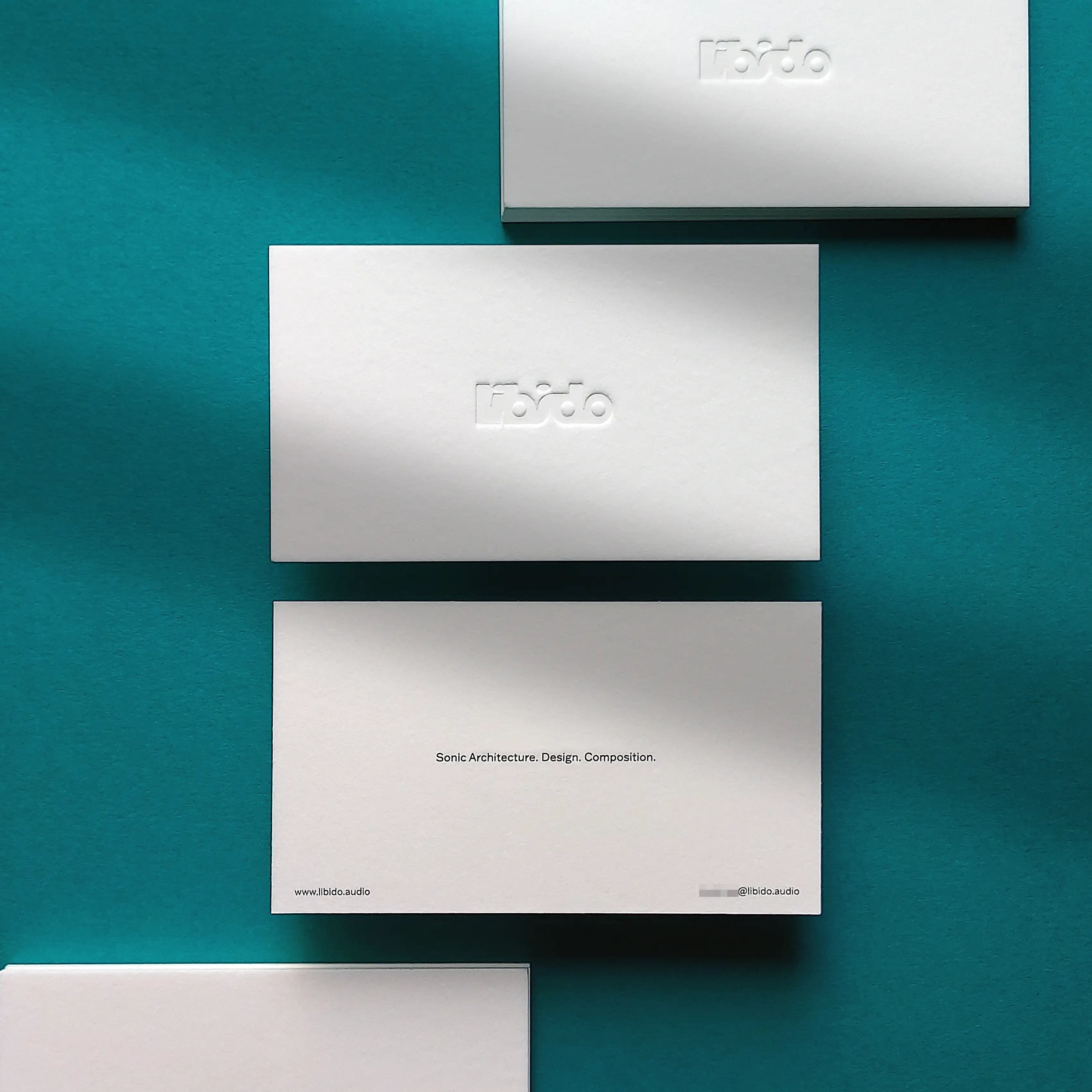 Letterpress cotton business cards 45pt with blind letterpress and black printing by OddPlanPrint