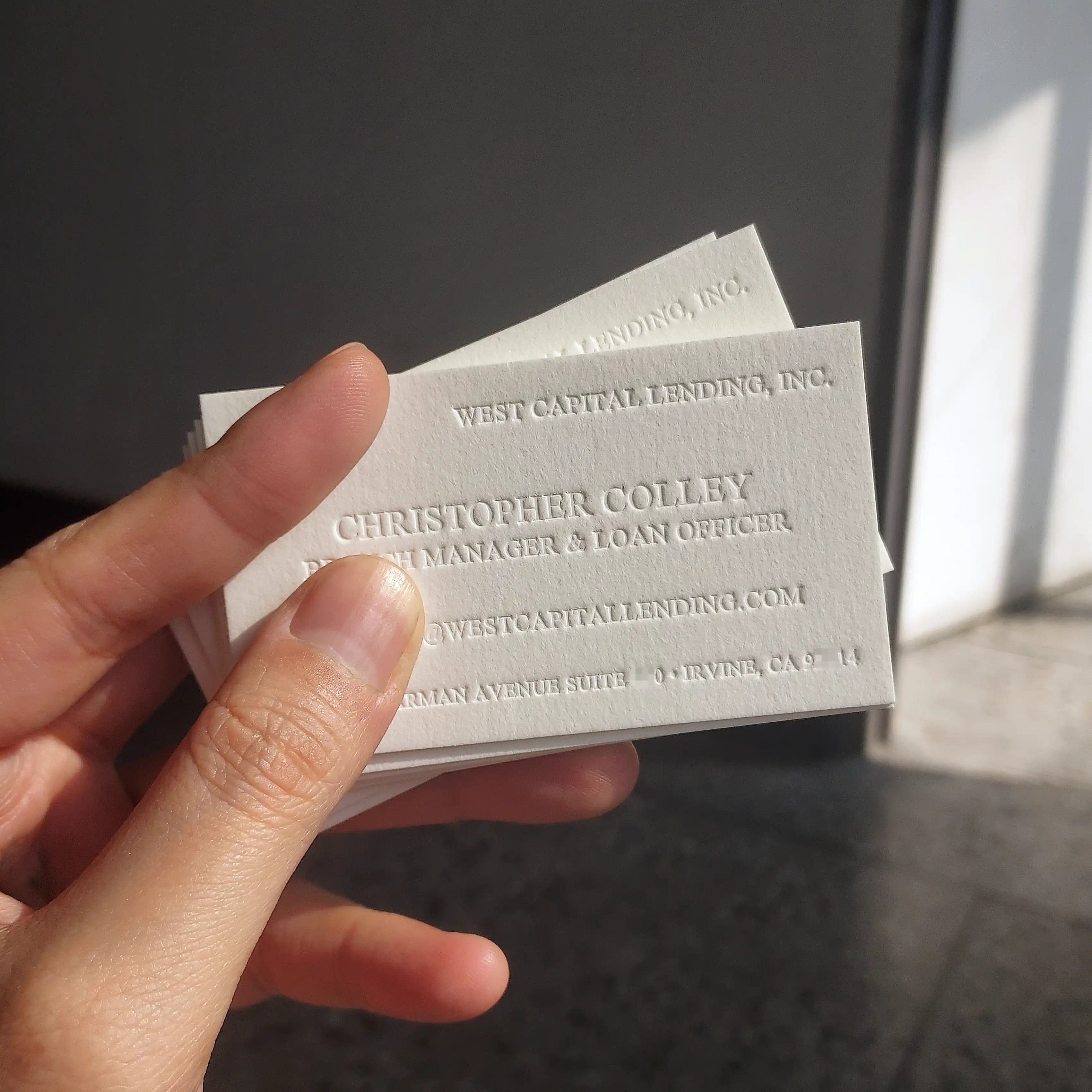 Luxury 45pt letterpress business card by OddPlanPrint, featuring blind letterpress and black printing.