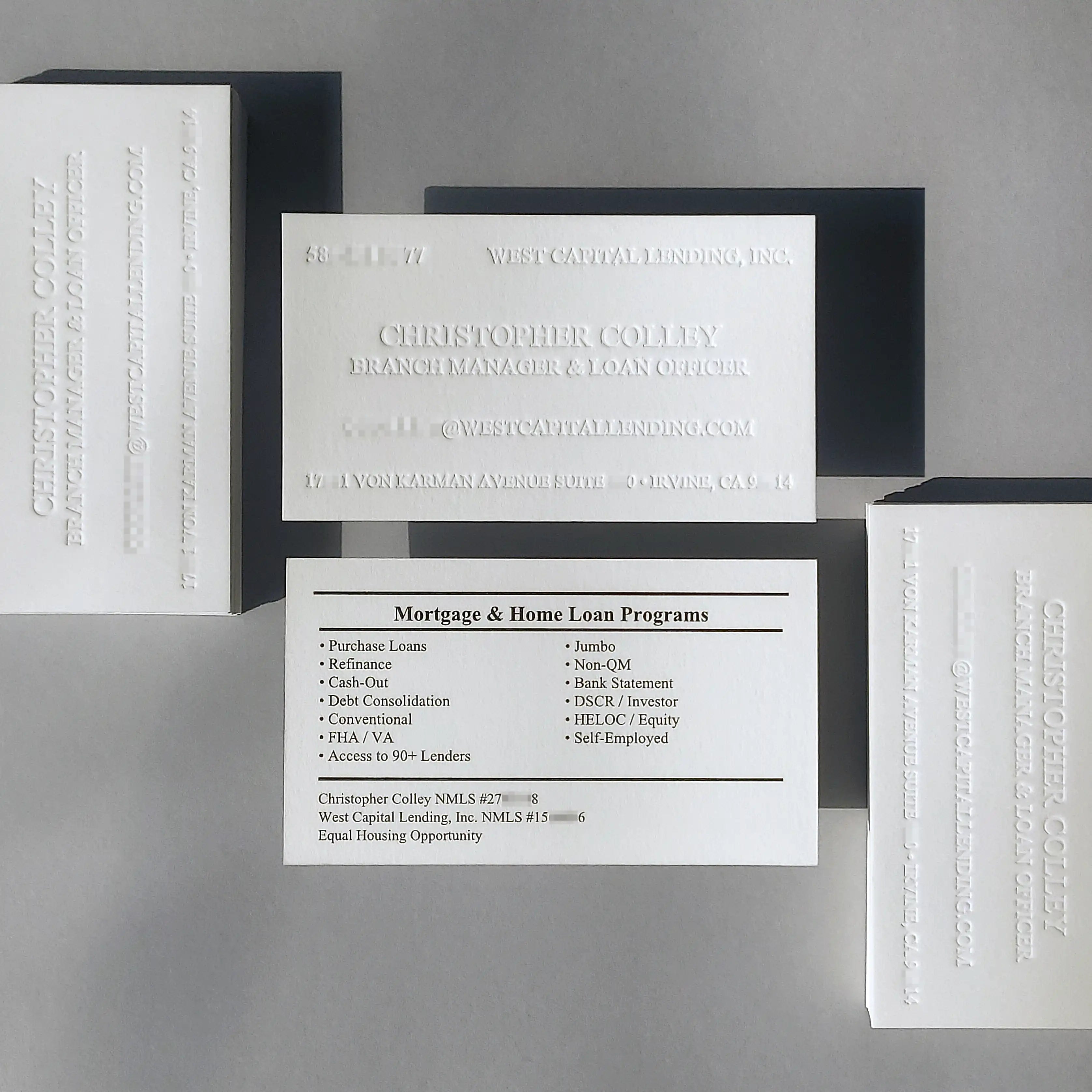 Tactile 45pt cotton business card by OddPlanPrint, showcasing blind letterpress and black ink. 
