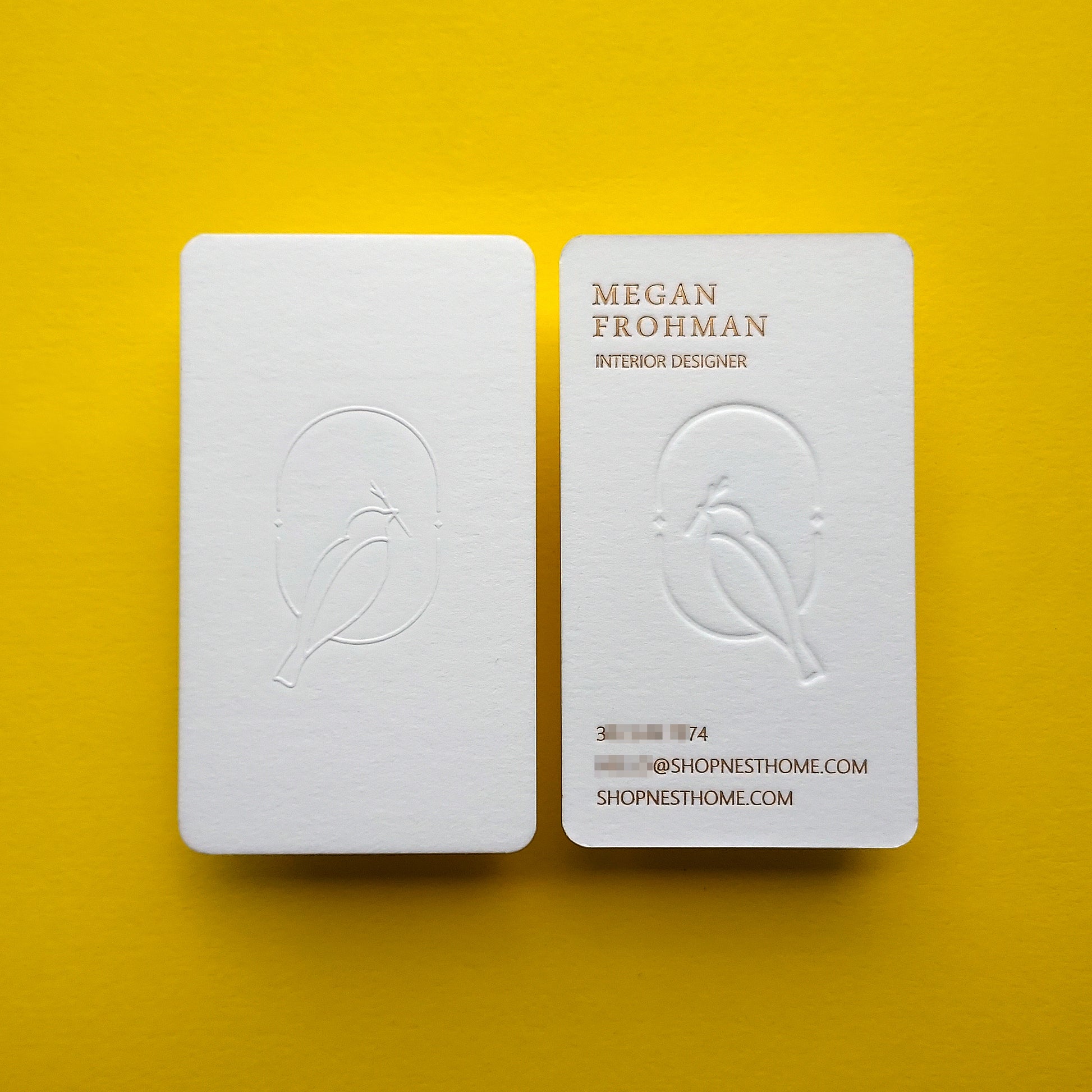 Letterpress business card with debossed logo