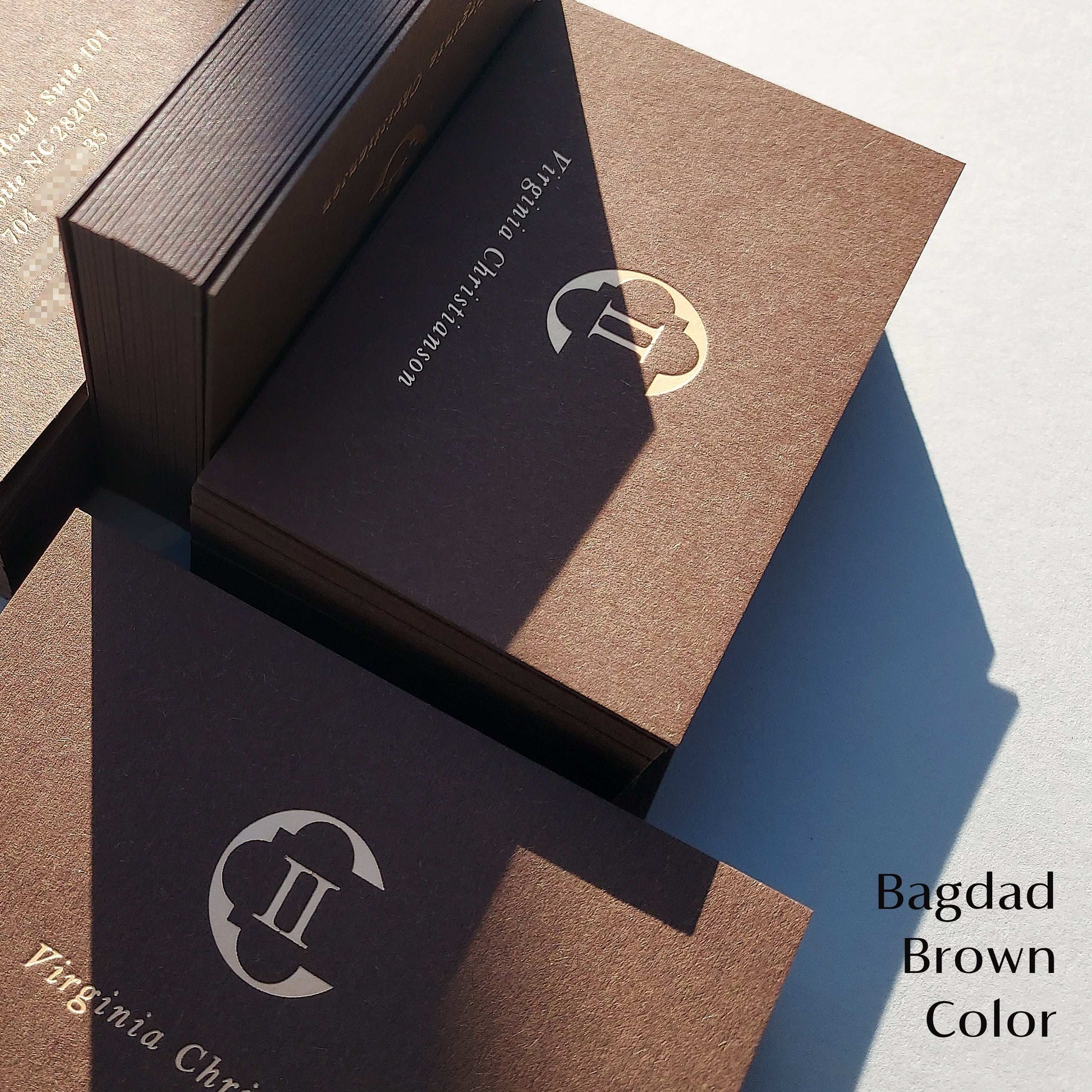 High-end brown card with foil stamping and thick construction for startups.