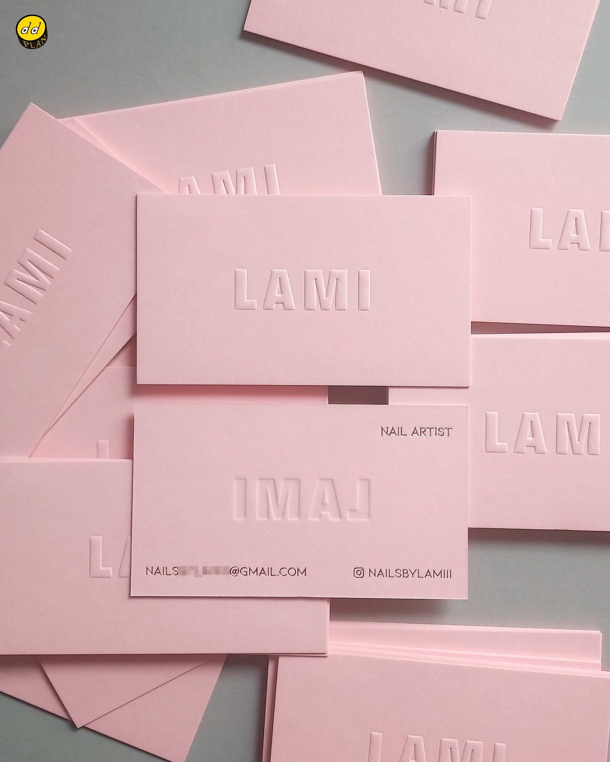 Deep embossed pink card crafted for artistic branding.