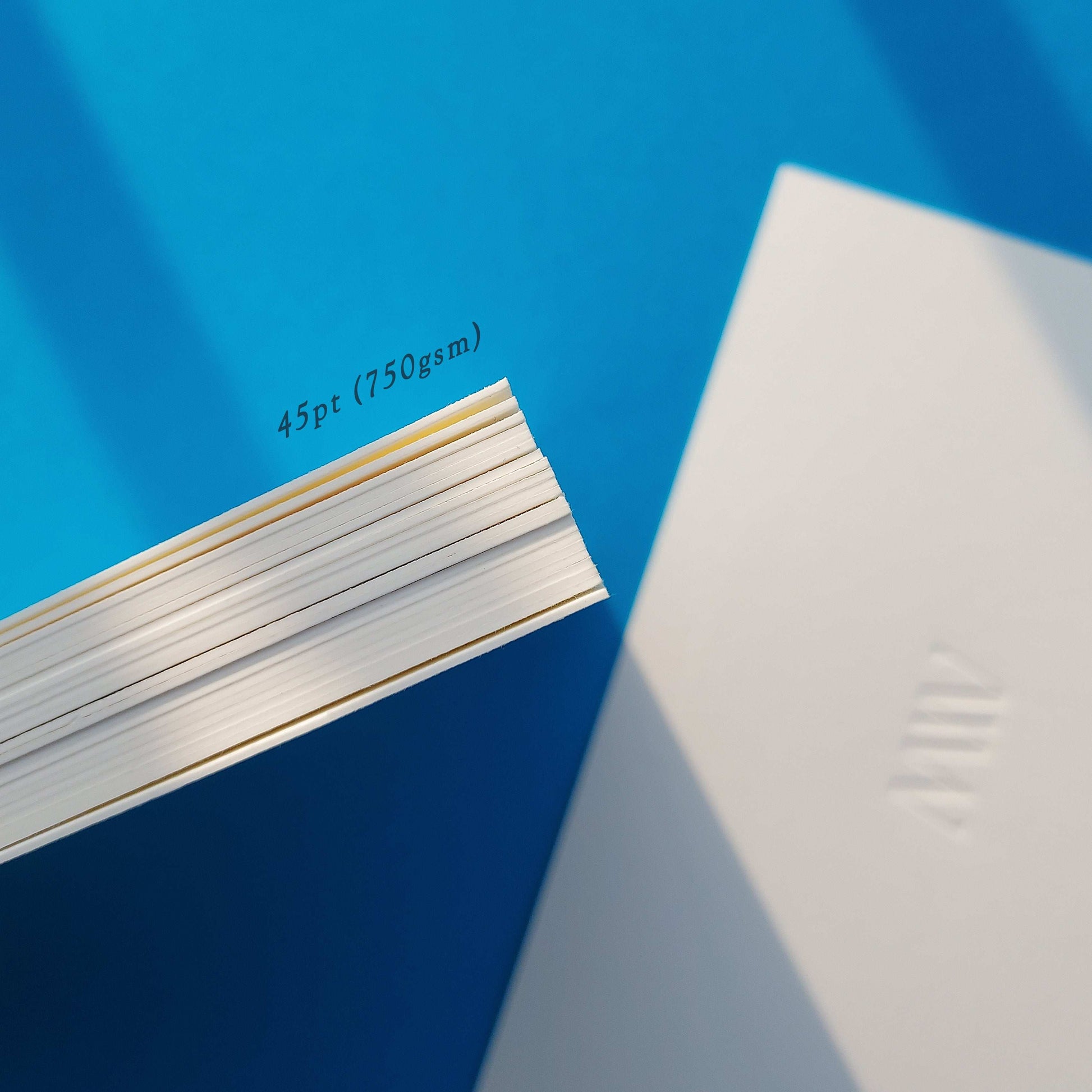 Luxury stationery postcard with custom foil and blind deboss work