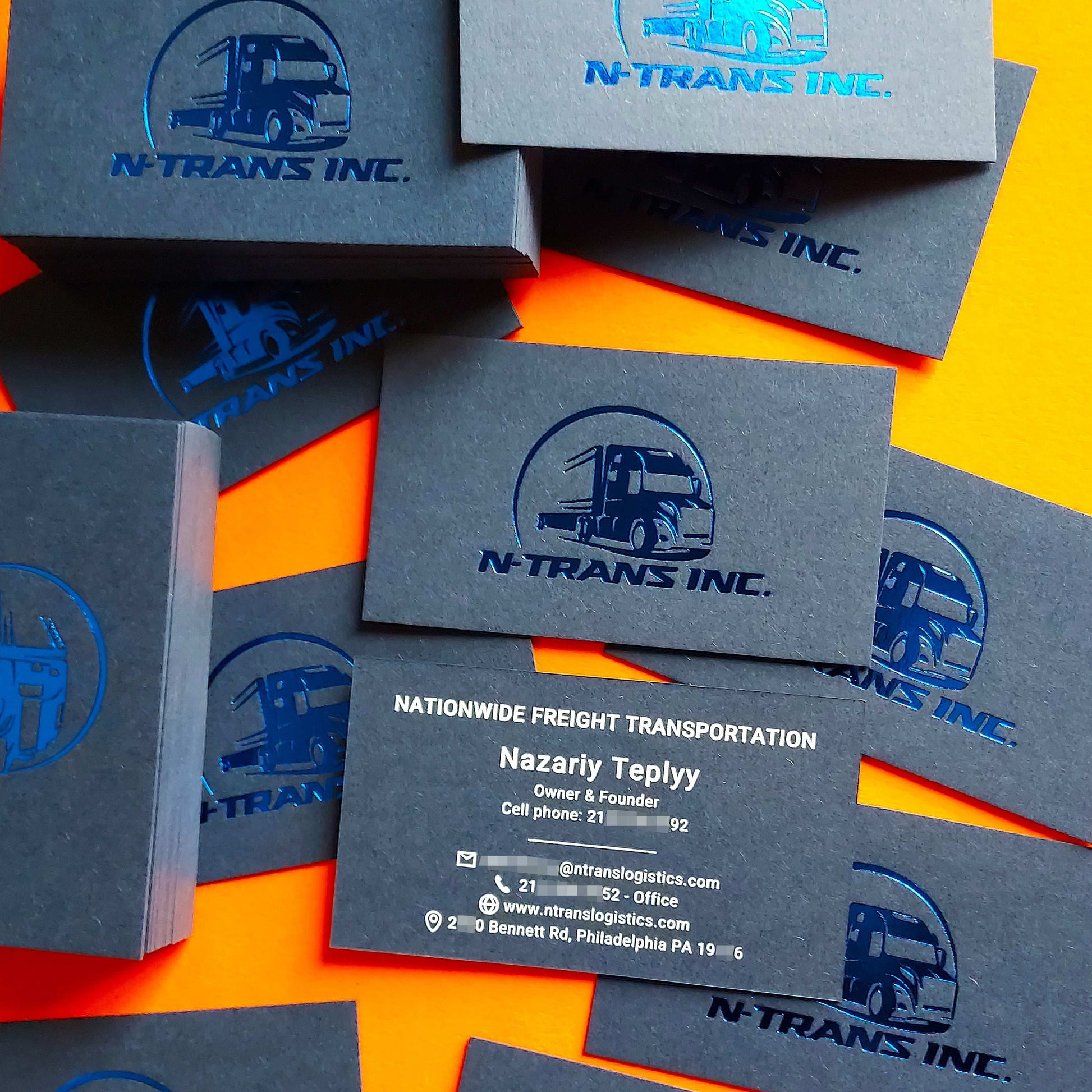 Creative custom blue business card for elegant, bold branding.