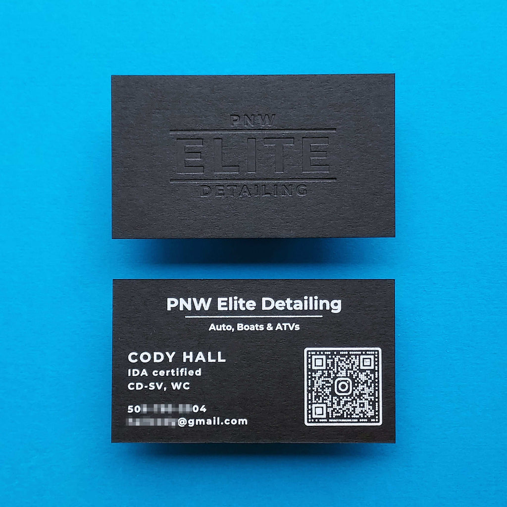 Bold and luxurious black business card with deep letterpress
