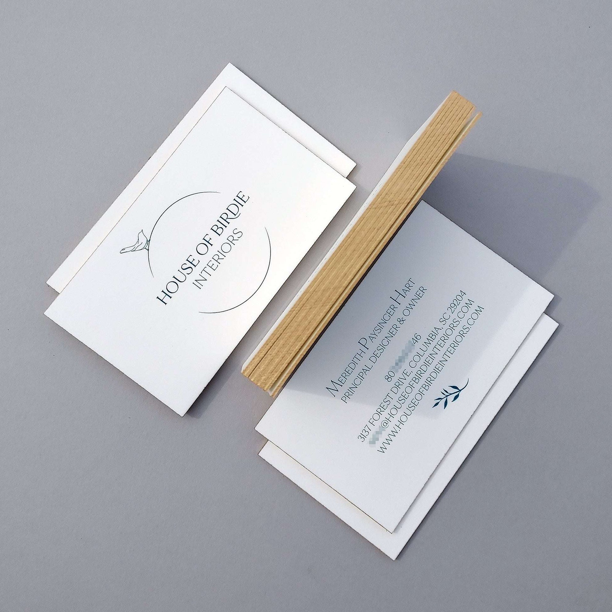 Sophisticated cotton card with gold edge paint and custom finish.