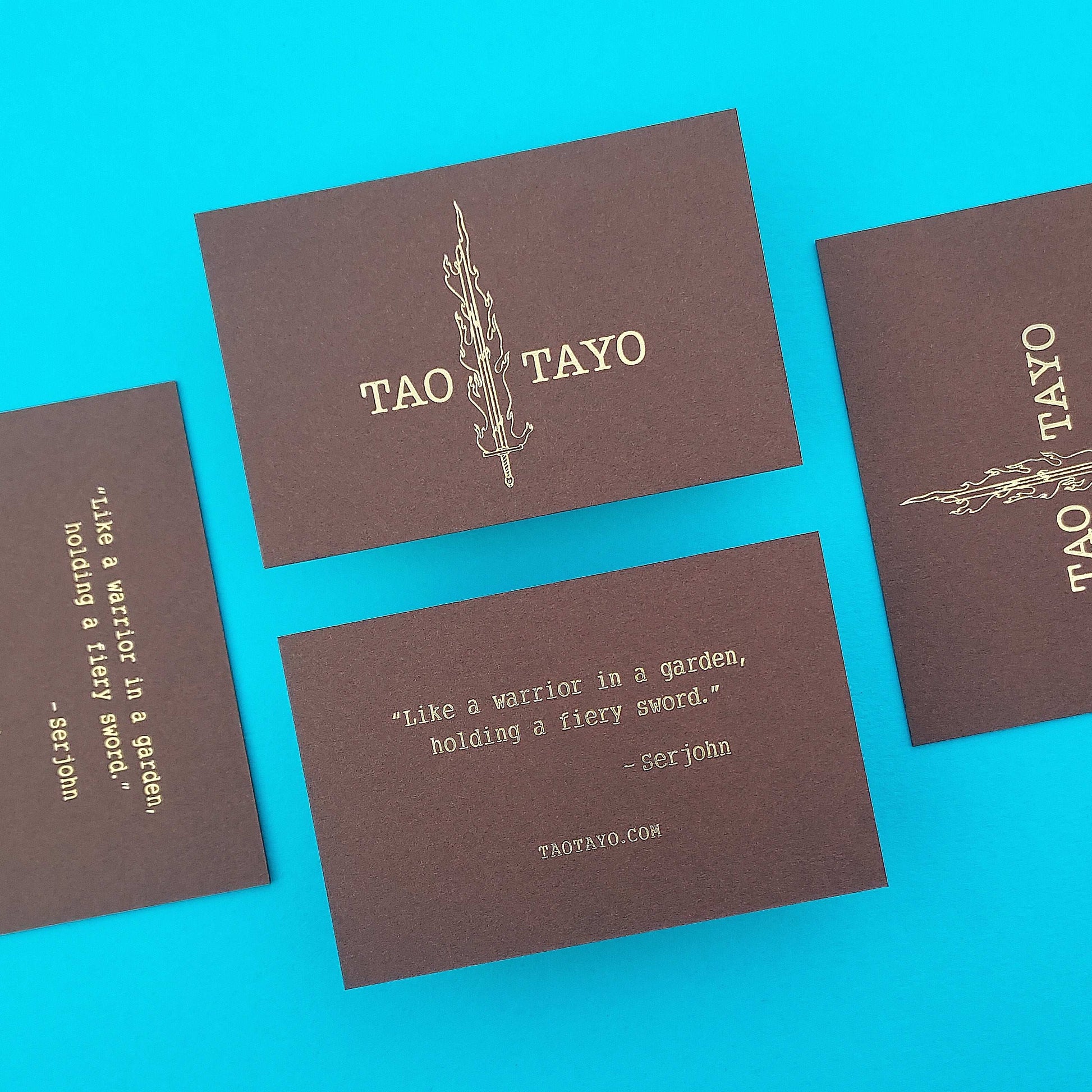 Handcrafted brown business card with deep texture and luxury foil.