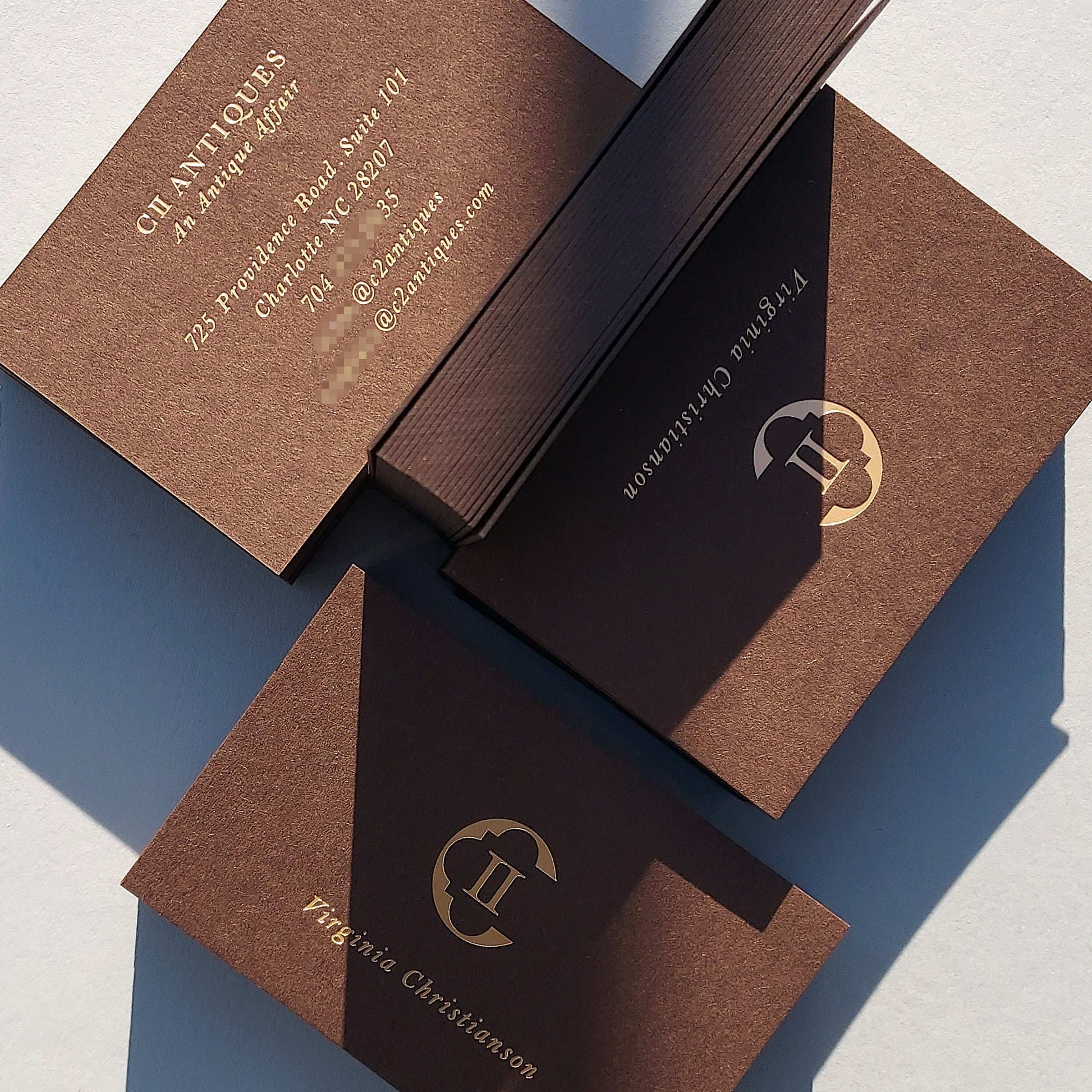 Brown custom card featuring deboss and thick cotton stock for modern professionals.