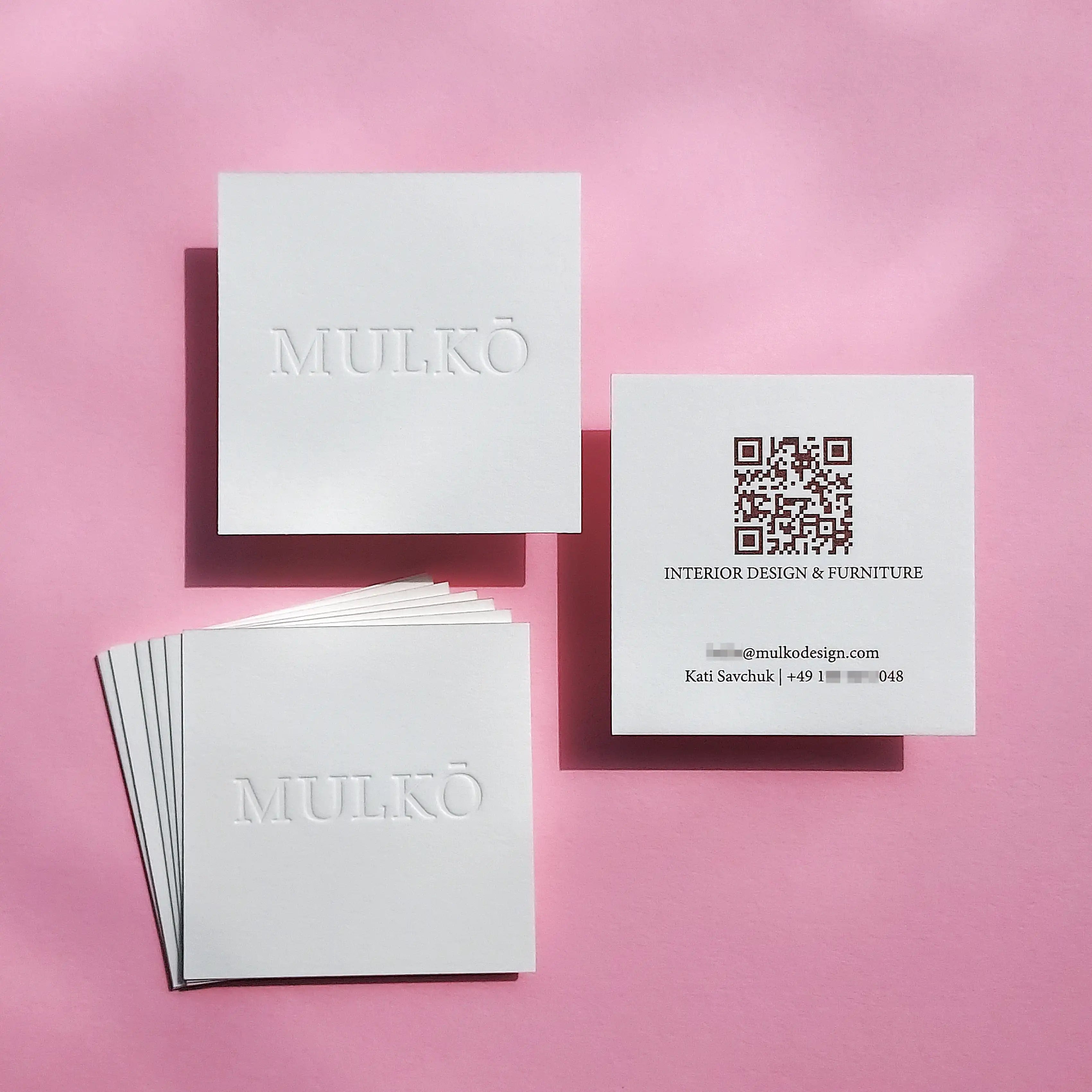 Luxury square 45pt cotton debossed business cards with brown pantone on back. made by OddPlanPrint.