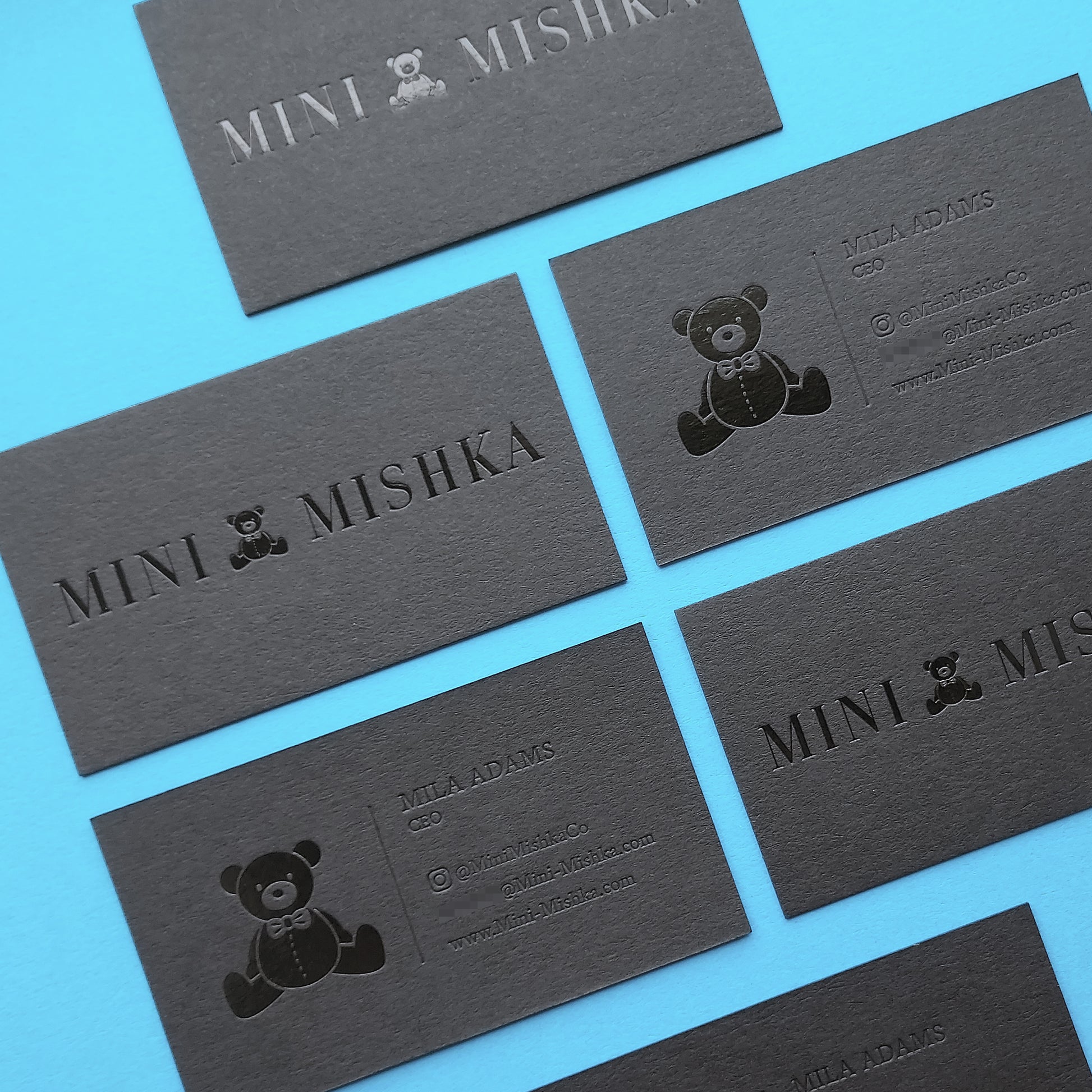 Sleek black card with luxurious deboss and fast shipping