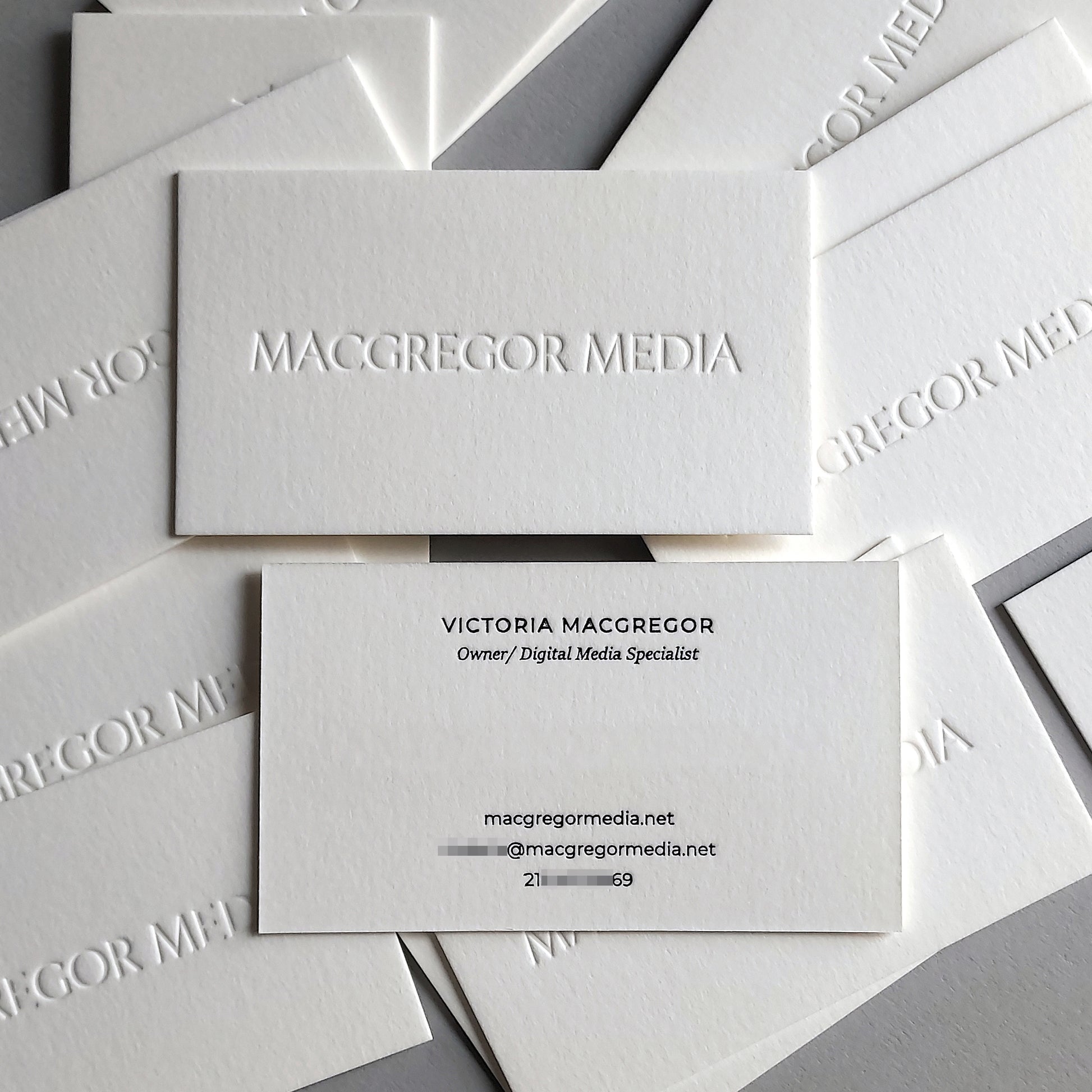 Debossed business card for elegant presentations