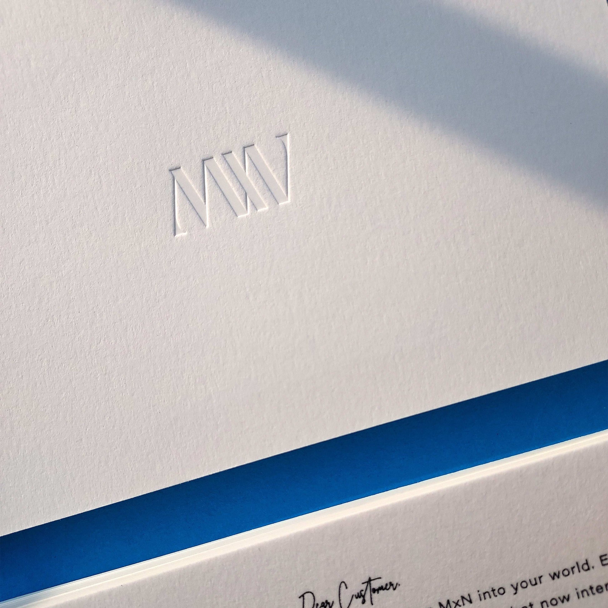 Custom note card with blind deboss, foil, and thick cotton texture
